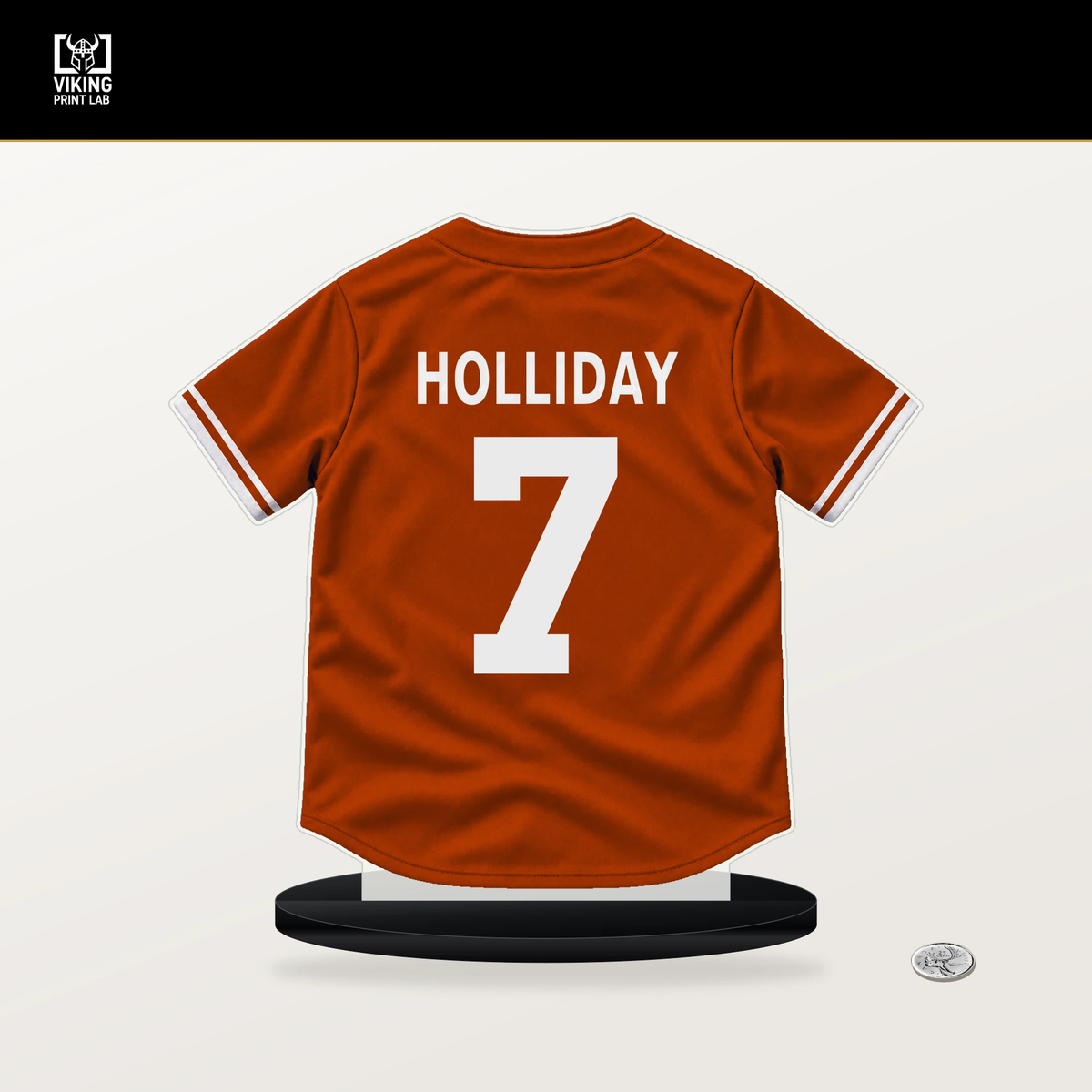 Jackson Holliday number 7 Baltimore Orioles jersey stand with included black base.