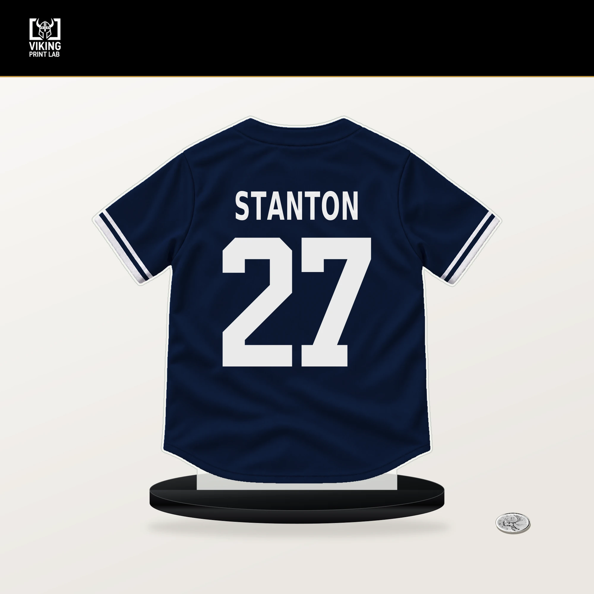 Giancarlo Stanton number 27 New York Yankees jersey stand with included black base.