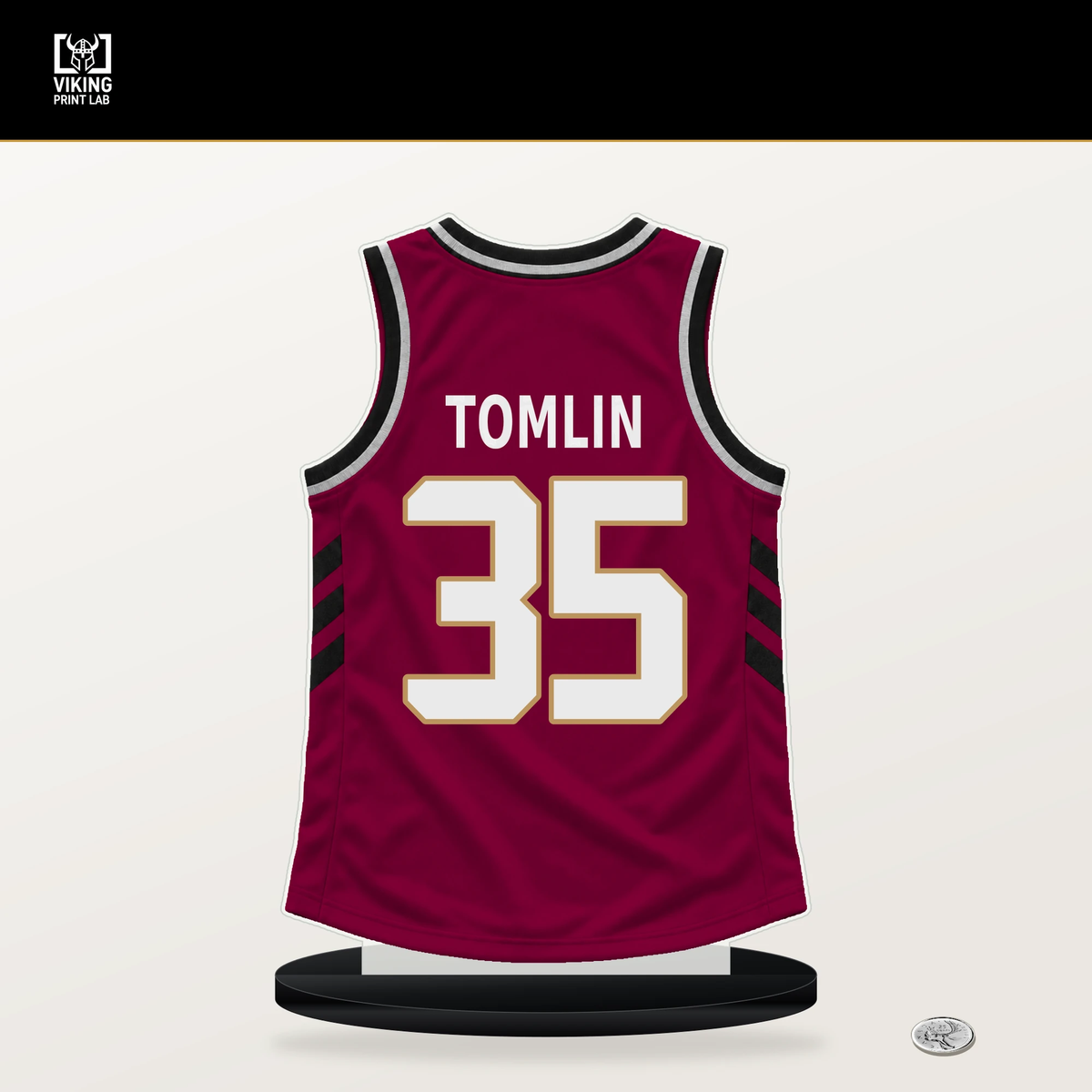 Nae'Qwan Tomlin number 35 Cleveland Cavaliers jersey stand with included black base.