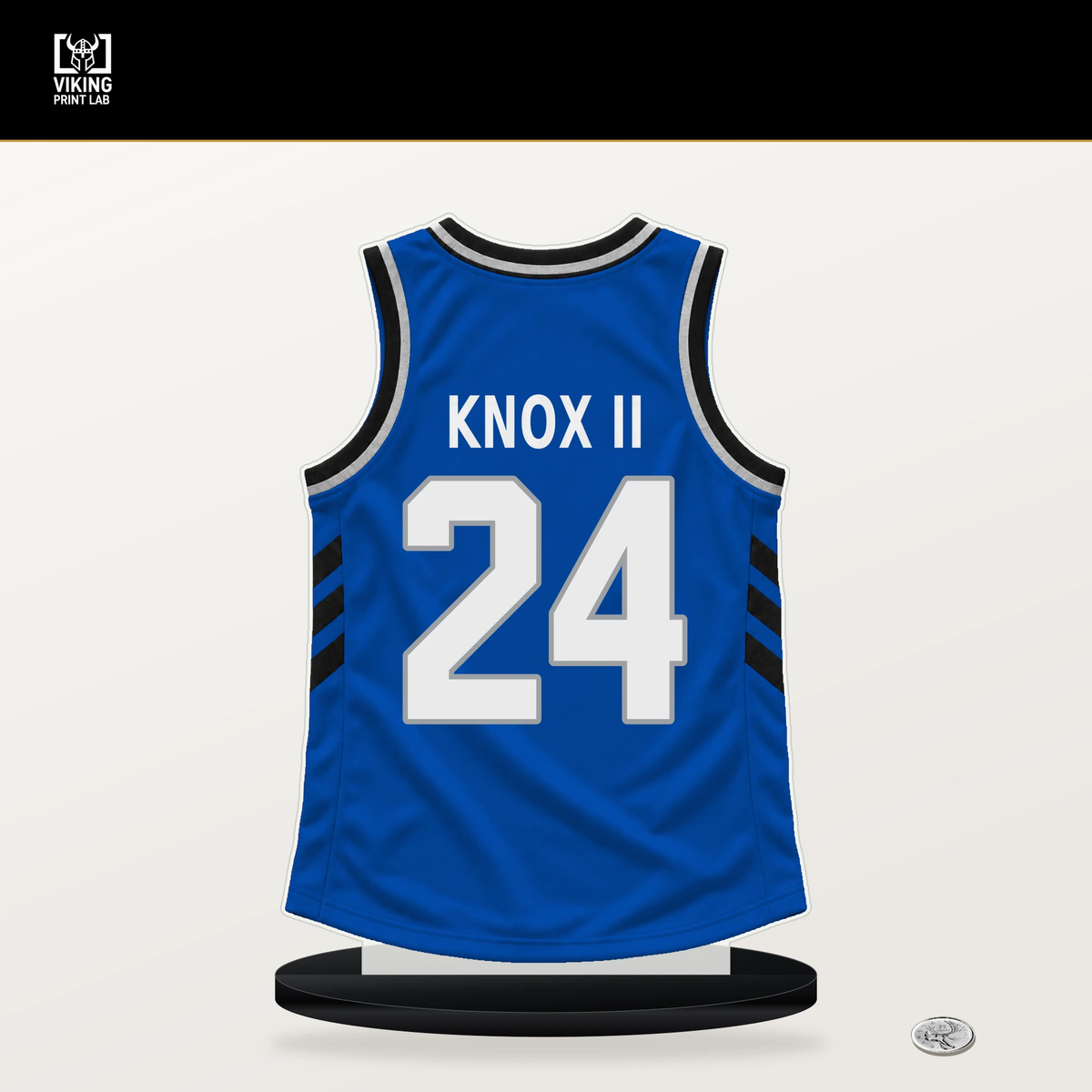 Kevin Knox II number 24 Orlando Magic jersey stand with included black base.