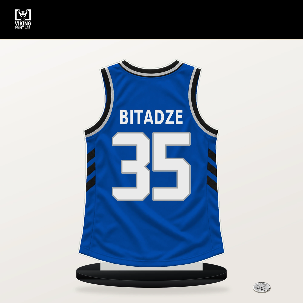 Goga Bitadze number 35 Orlando Magic jersey stand with included black base.
