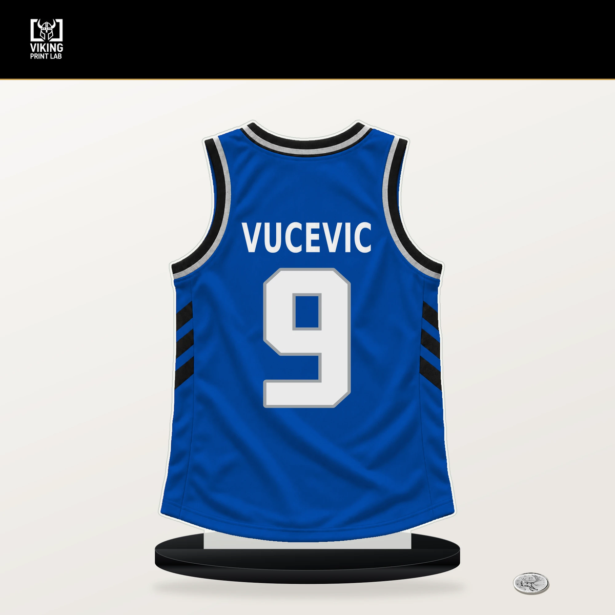 Nikola Vucevic number 9 Orlando Magic jersey stand with included black base.