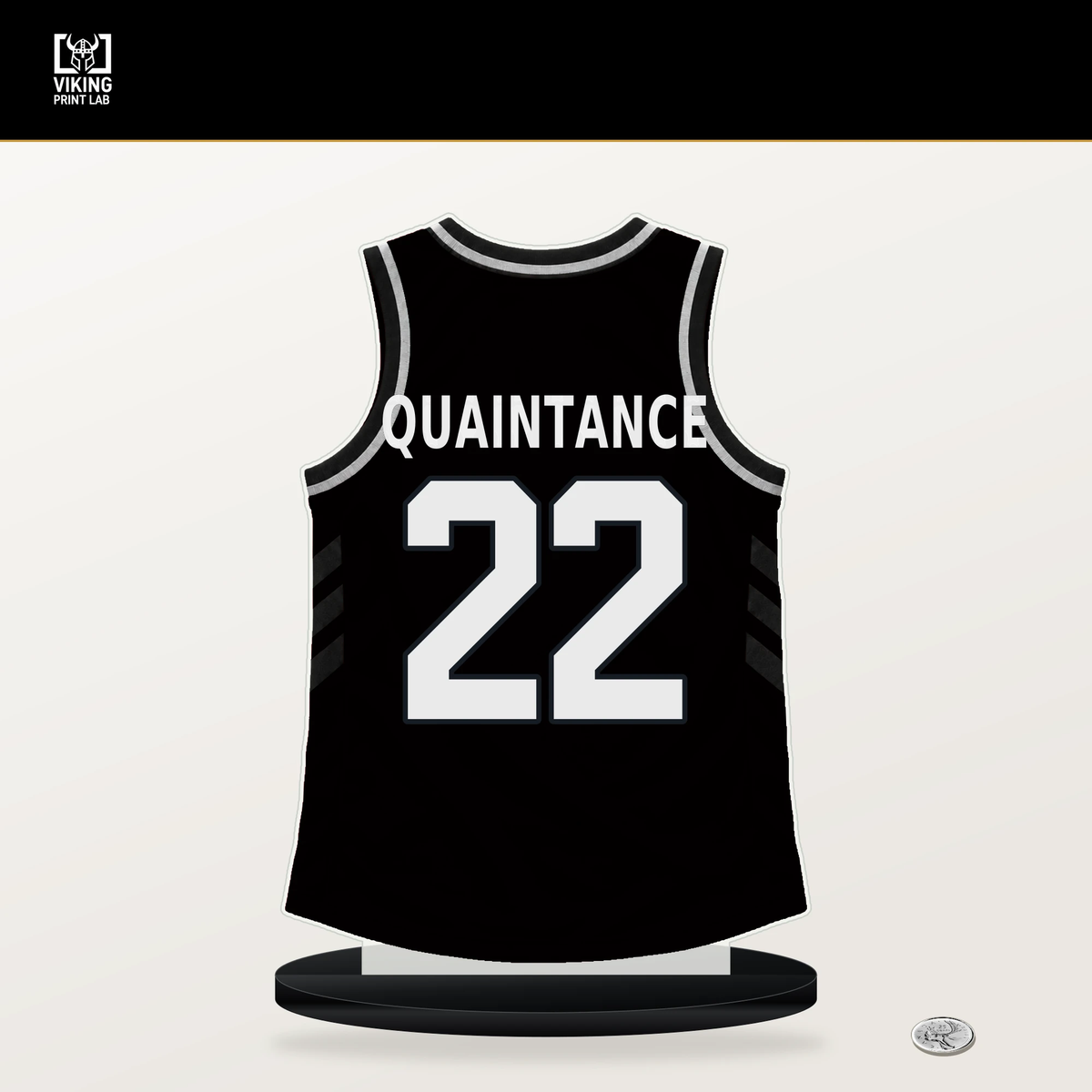Jayden Quaintance number 22 San Antonio Spurs jersey stand with included black base.