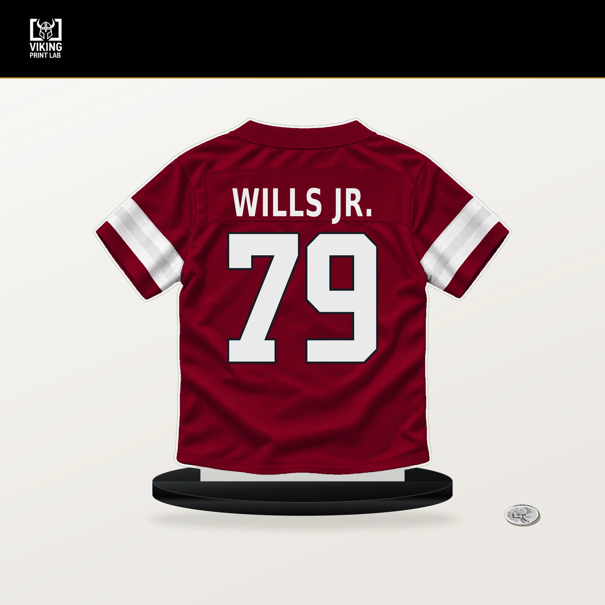 Jedrick Wills Jr. number 79 Arizona Cardinals jersey stand with included black base.