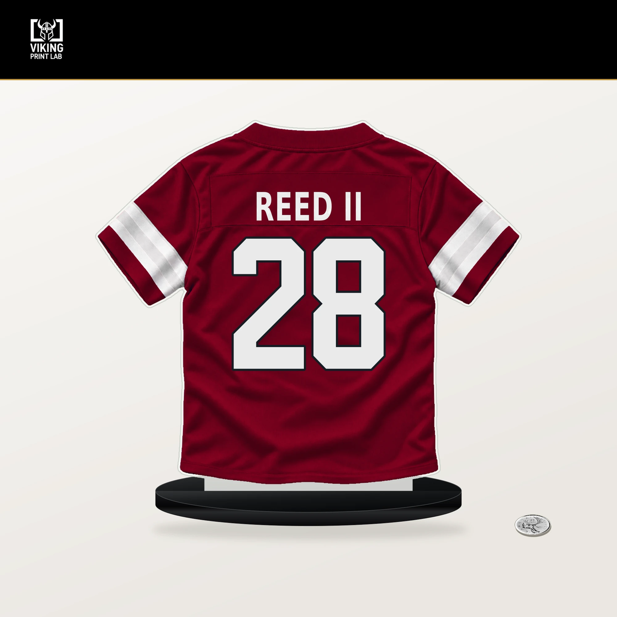 Jerrick Reed II number 28 Arizona Cardinals jersey stand with included black base.