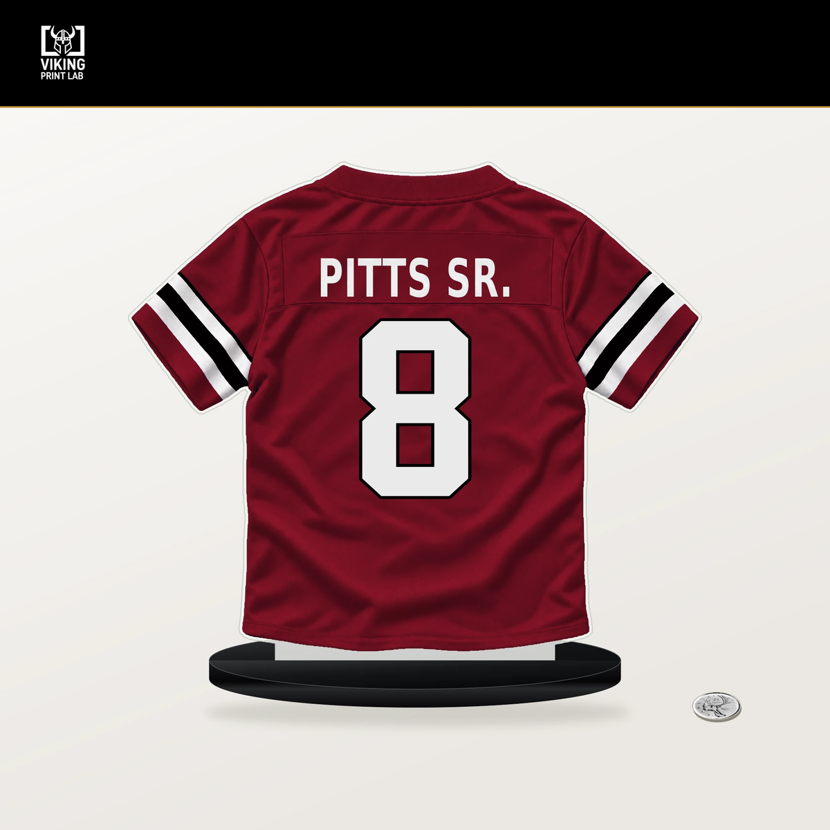 Kyle Pitts Sr. number 8 Atlanta Falcons jersey stand with included black base.