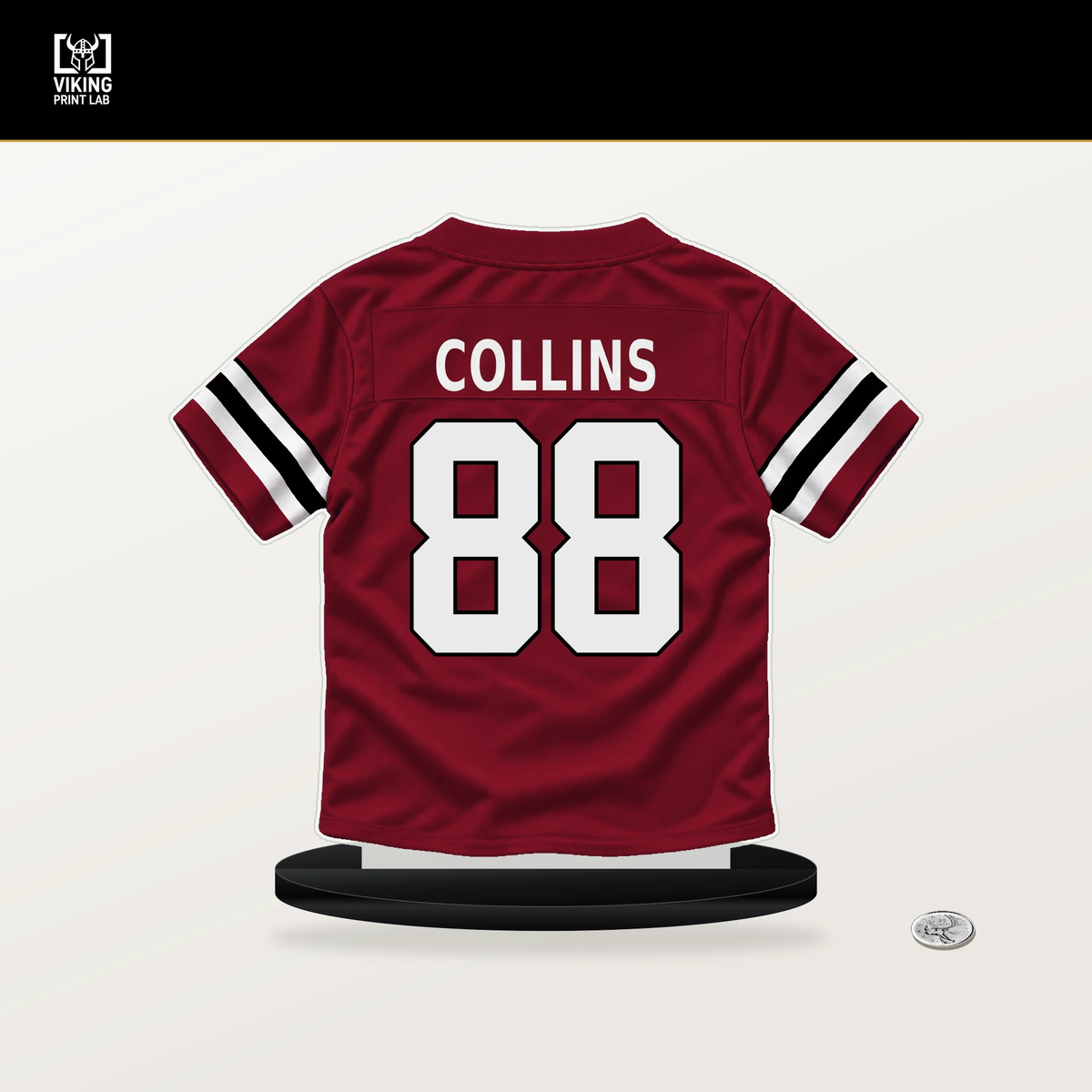 Beaux Collins number 88 Atlanta Falcons jersey stand with included black base.