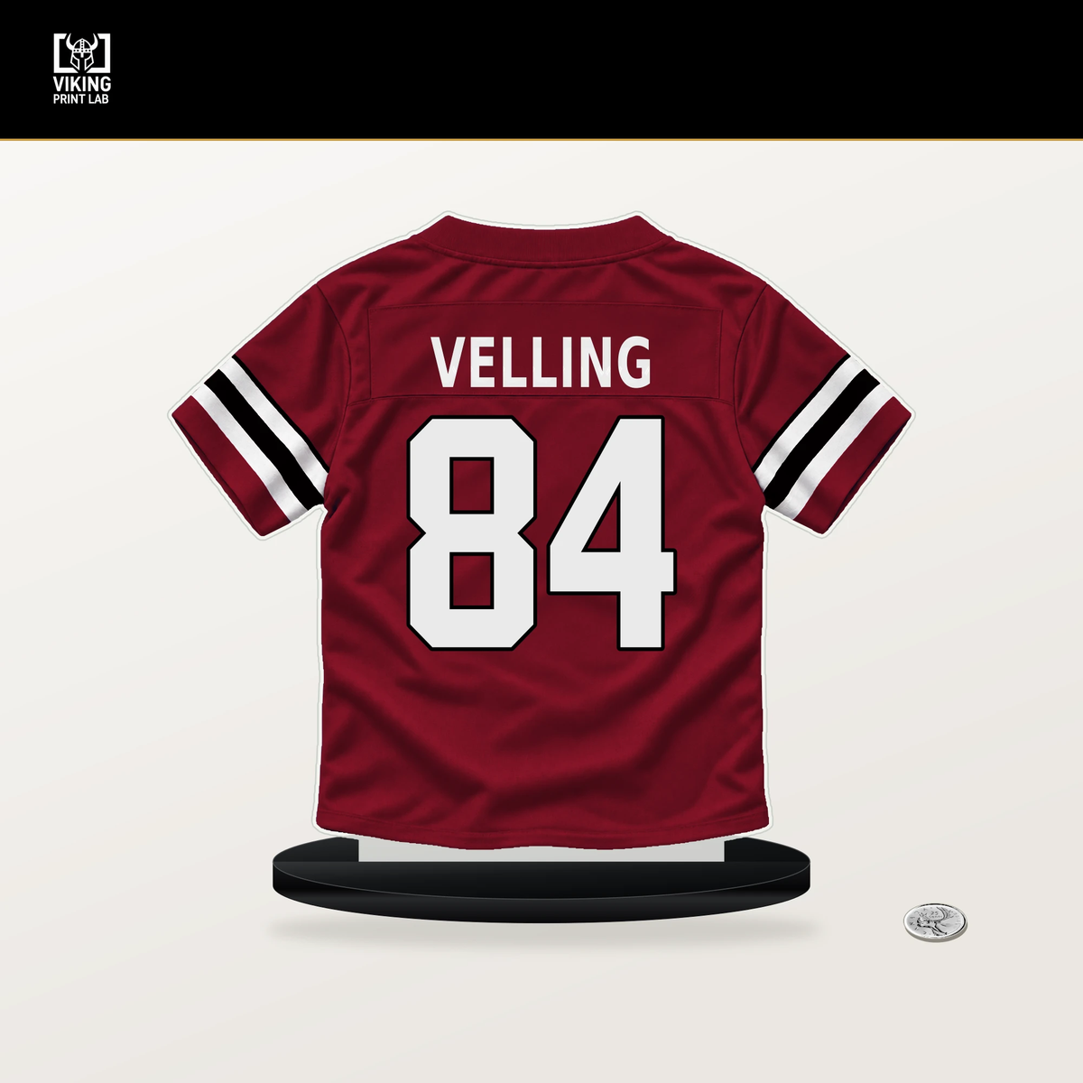 Jack Velling number 84 Atlanta Falcons jersey stand with included black base.