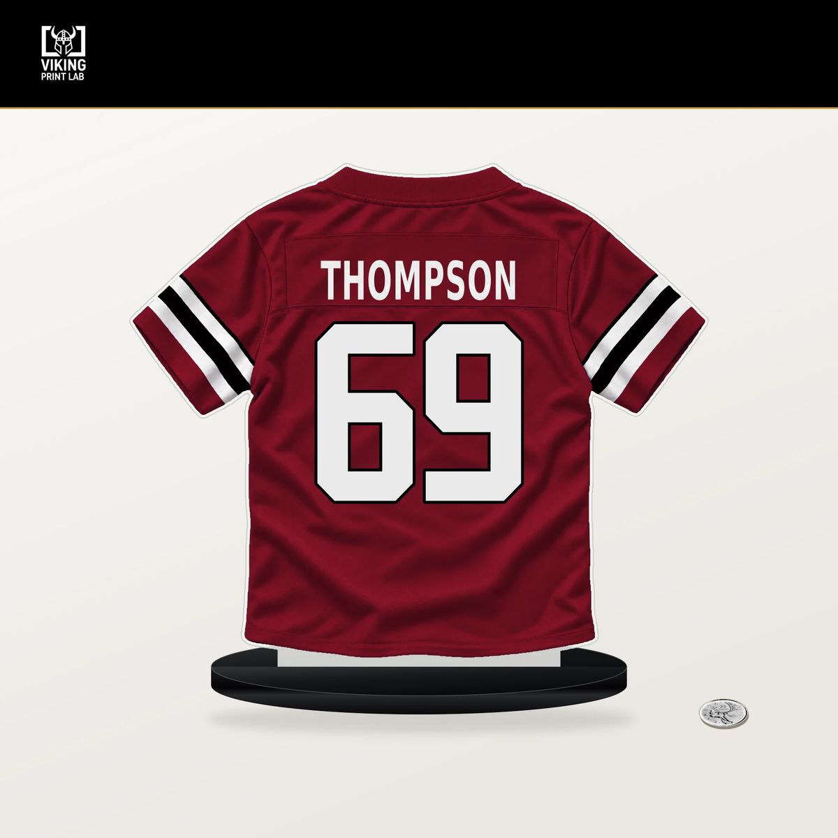 Anterio Thompson number 69 Atlanta Falcons jersey stand with included black base.