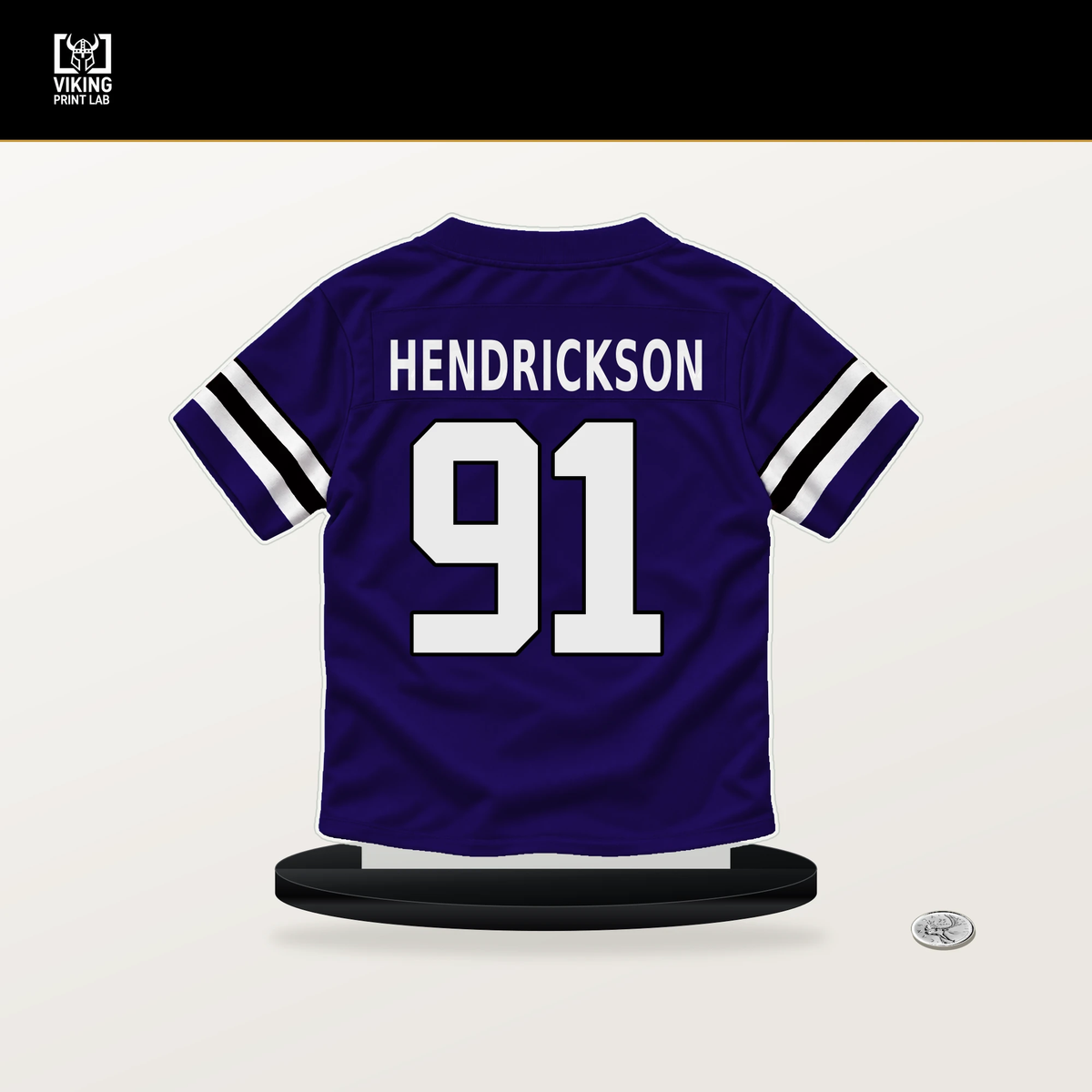 Trey Hendrickson number 91 Baltimore Ravens jersey stand with included black base.