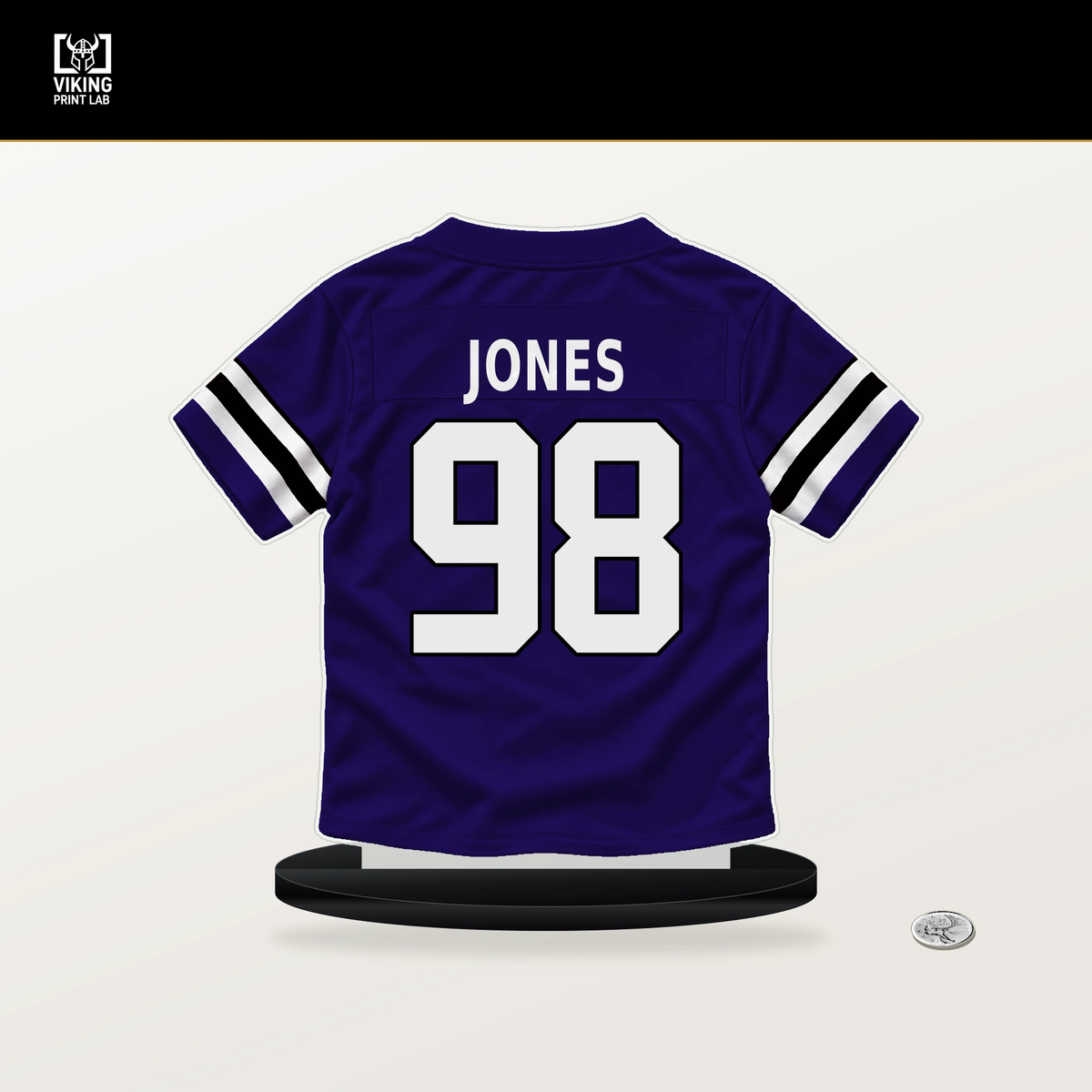 Travis Jones number 98 Baltimore Ravens jersey stand with included black base.