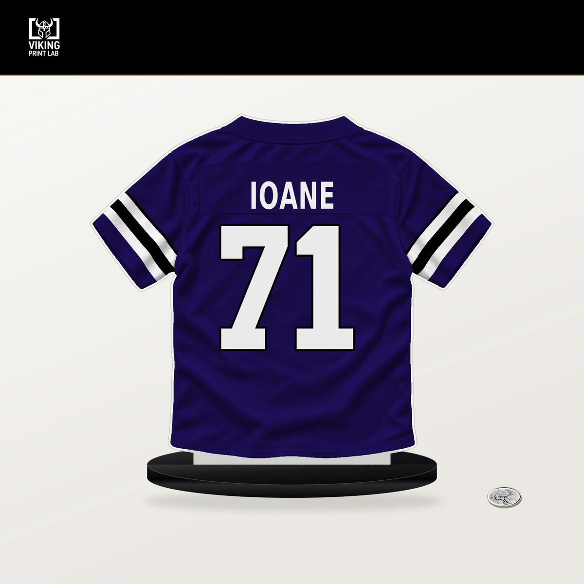 Olaivavega Ioane number 71 Baltimore Ravens jersey stand with included black base.
