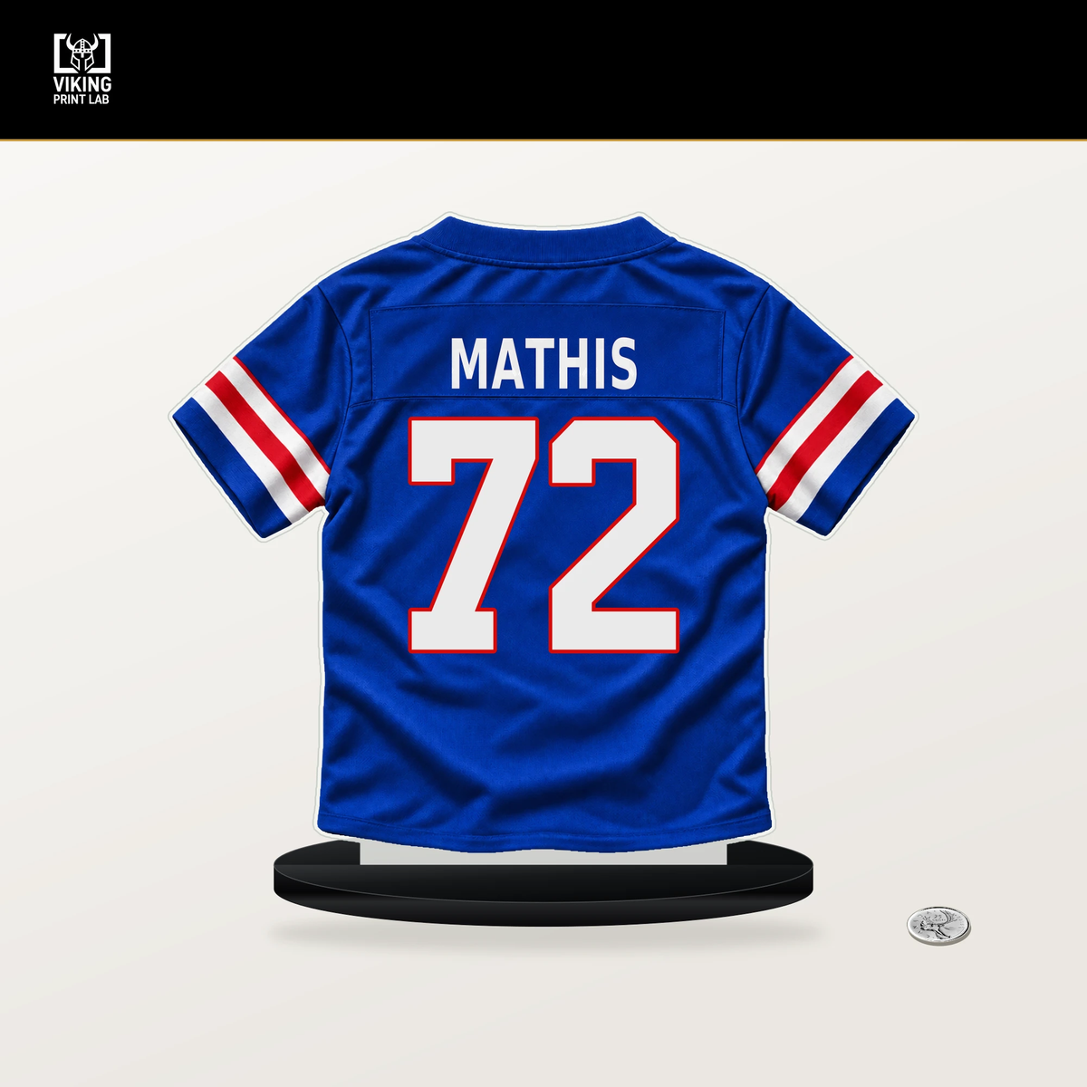 Phidarian Mathis number 72 Buffalo Bills jersey stand with included black base.