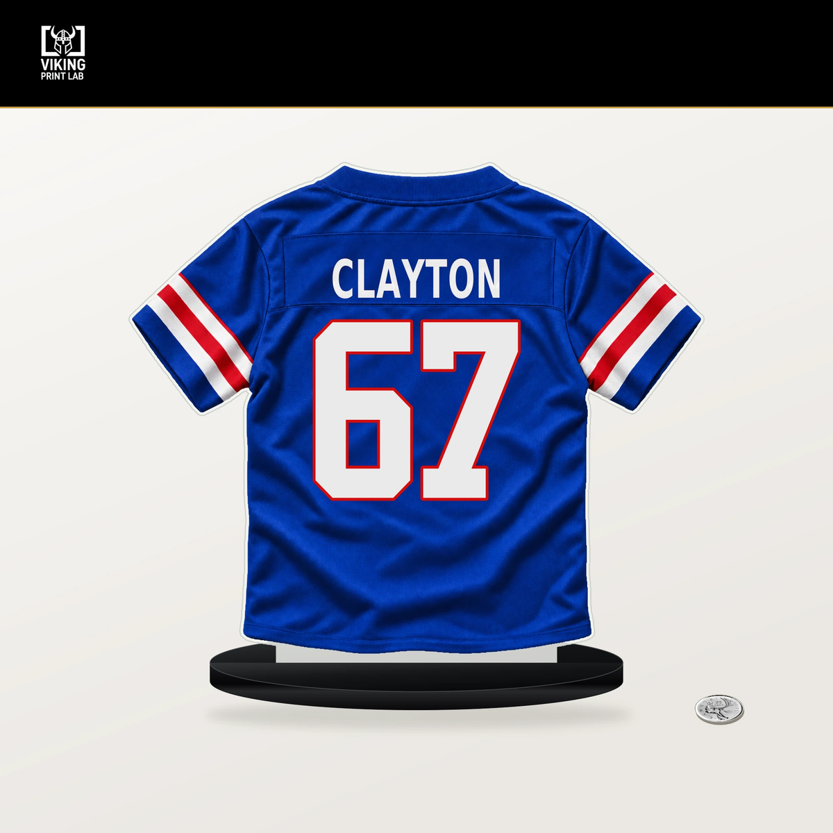 Travis Clayton number 67 Buffalo Bills jersey stand with included black base.