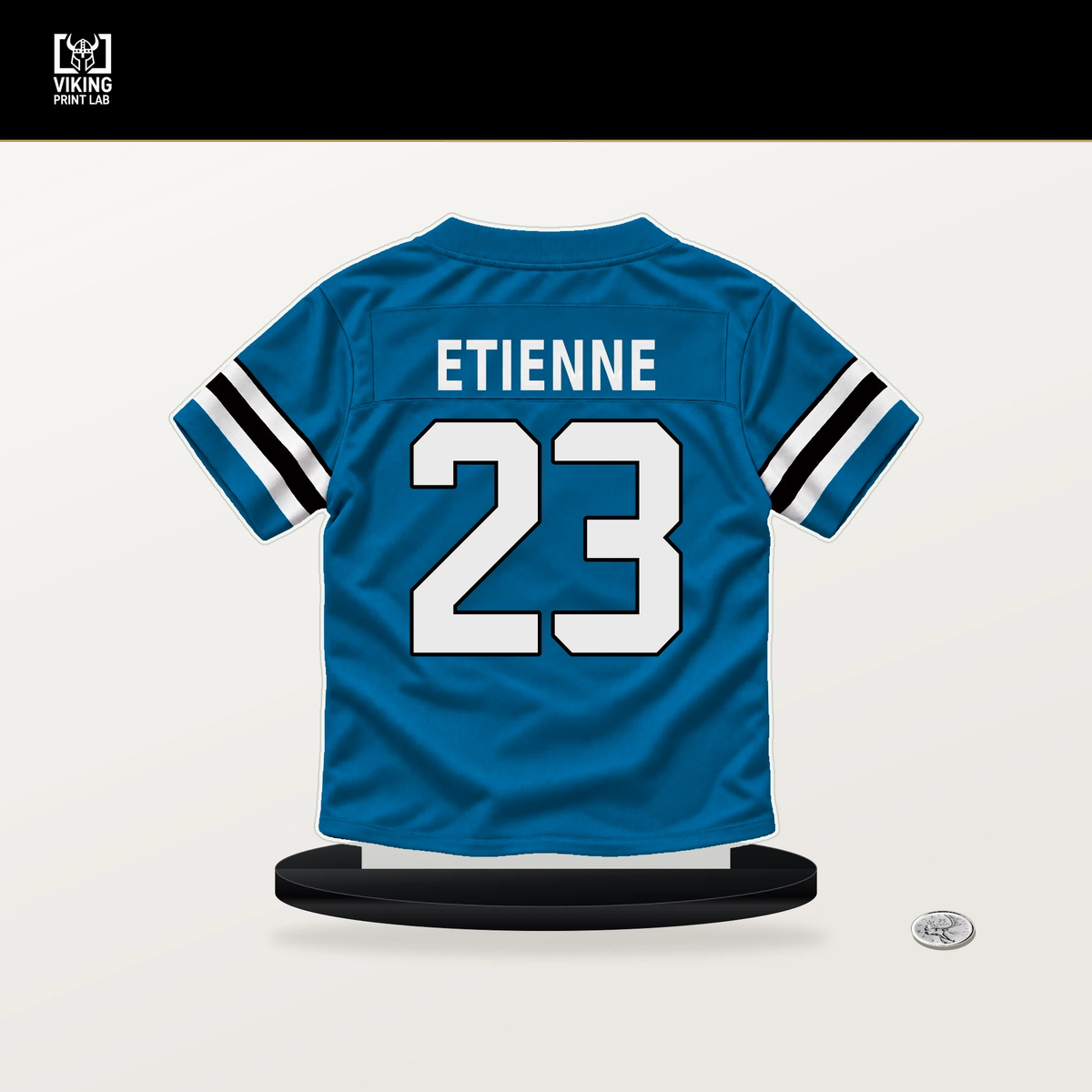 Trevor Etienne number 23 Carolina Panthers jersey stand with included black base.
