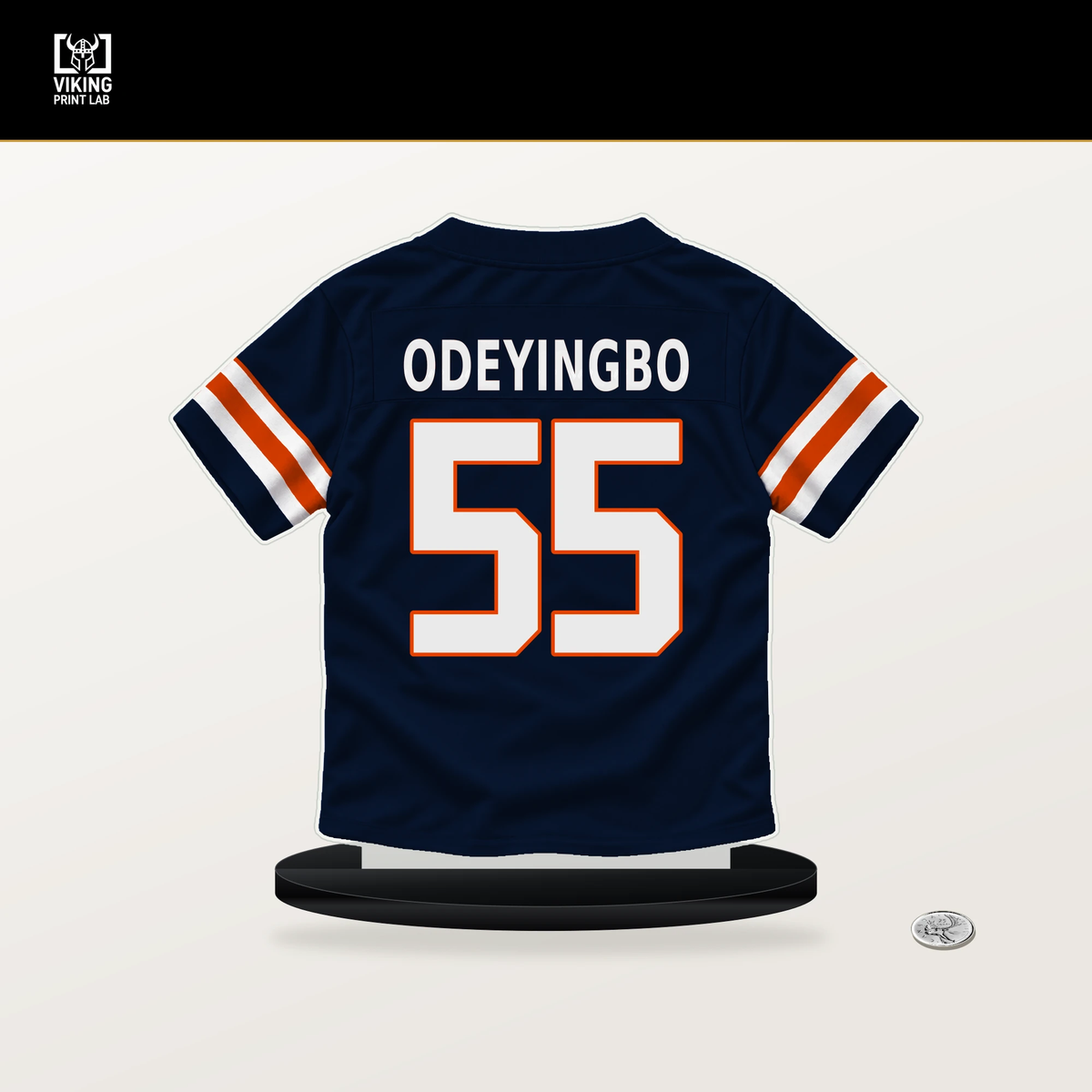 Dayo Odeyingbo number 55 Chicago Bears jersey stand with included black base.
