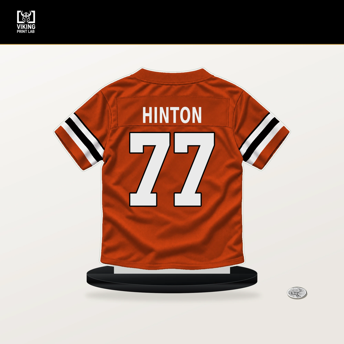 Myles Hinton number 77 Cincinnati Bengals jersey stand with included black base.