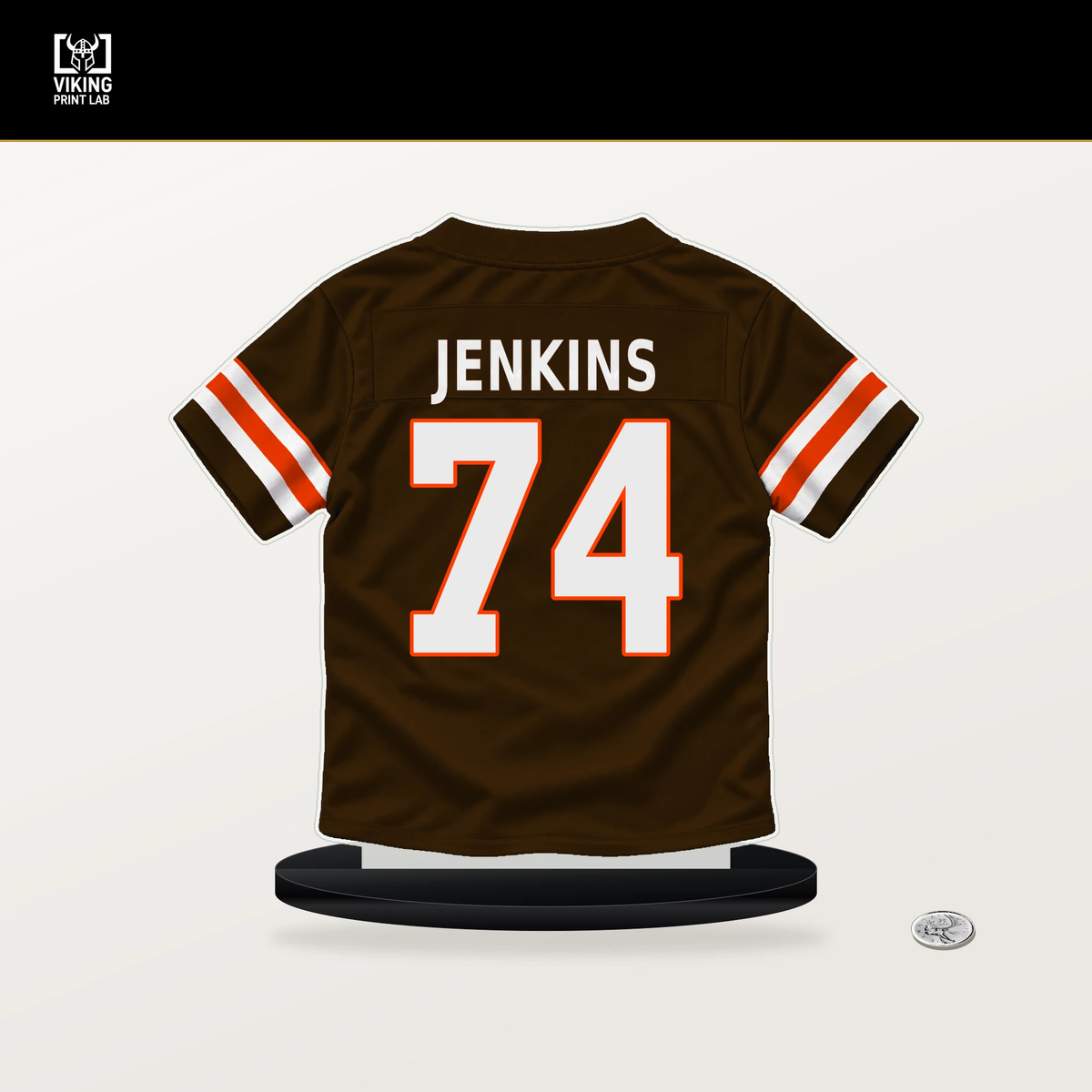 Elgton Jenkins number 74 Cleveland Browns jersey stand with included black base.