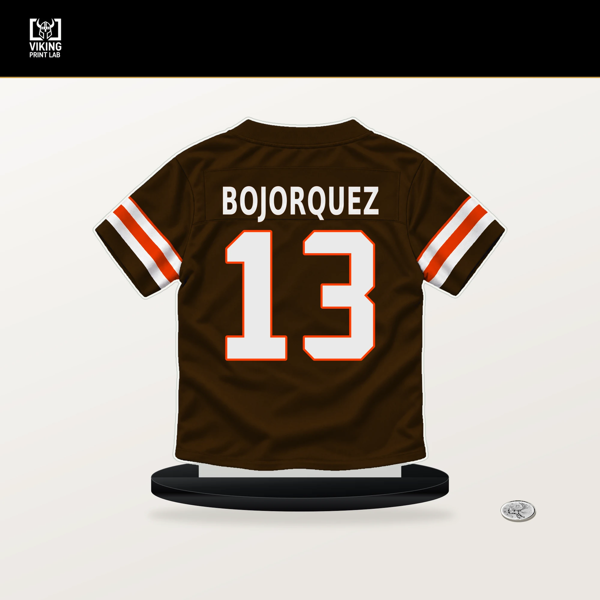 Corey Bojorquez number 13 Cleveland Browns jersey stand with included black base.