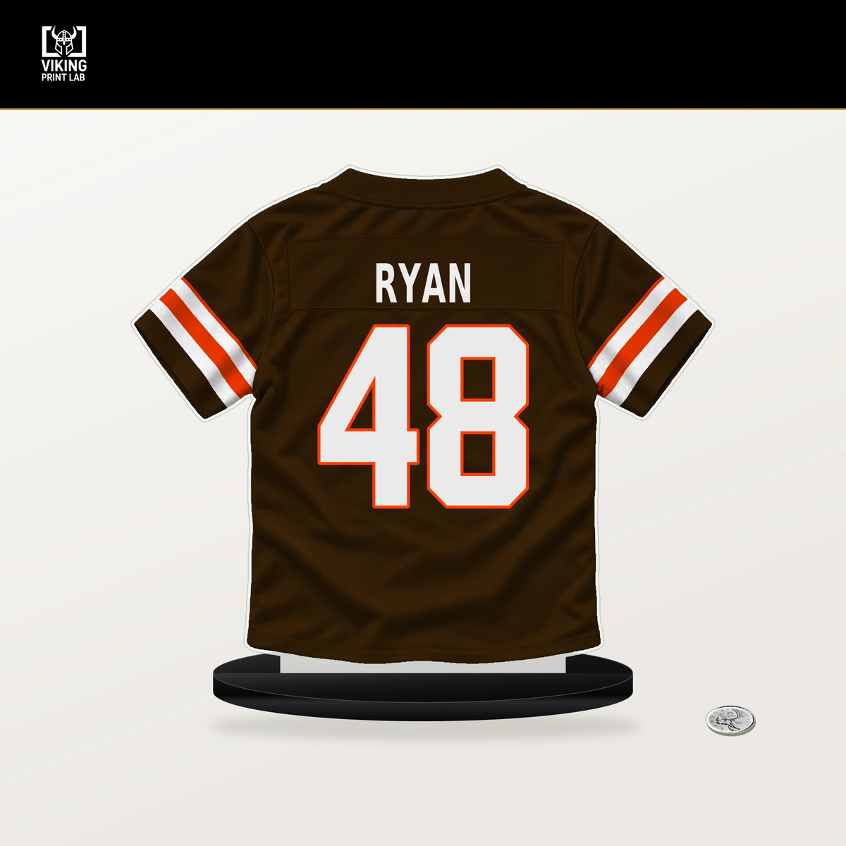 Carsen Ryan number 48 Cleveland Browns jersey stand with included black base.