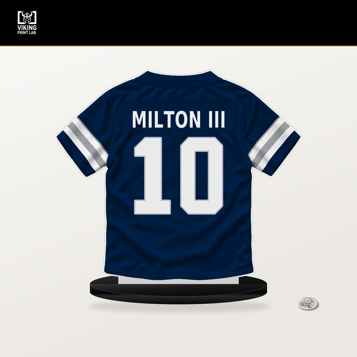 Joe Milton III number 10 Dallas Cowboys jersey stand with included black base.