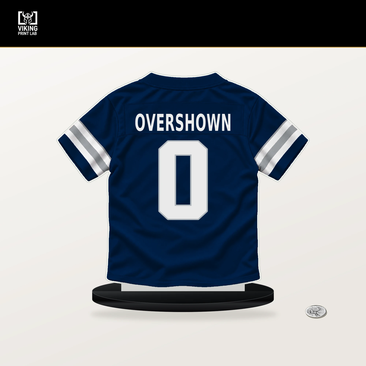 DeMarvion Overshown number 0 Dallas Cowboys jersey stand with included black base.