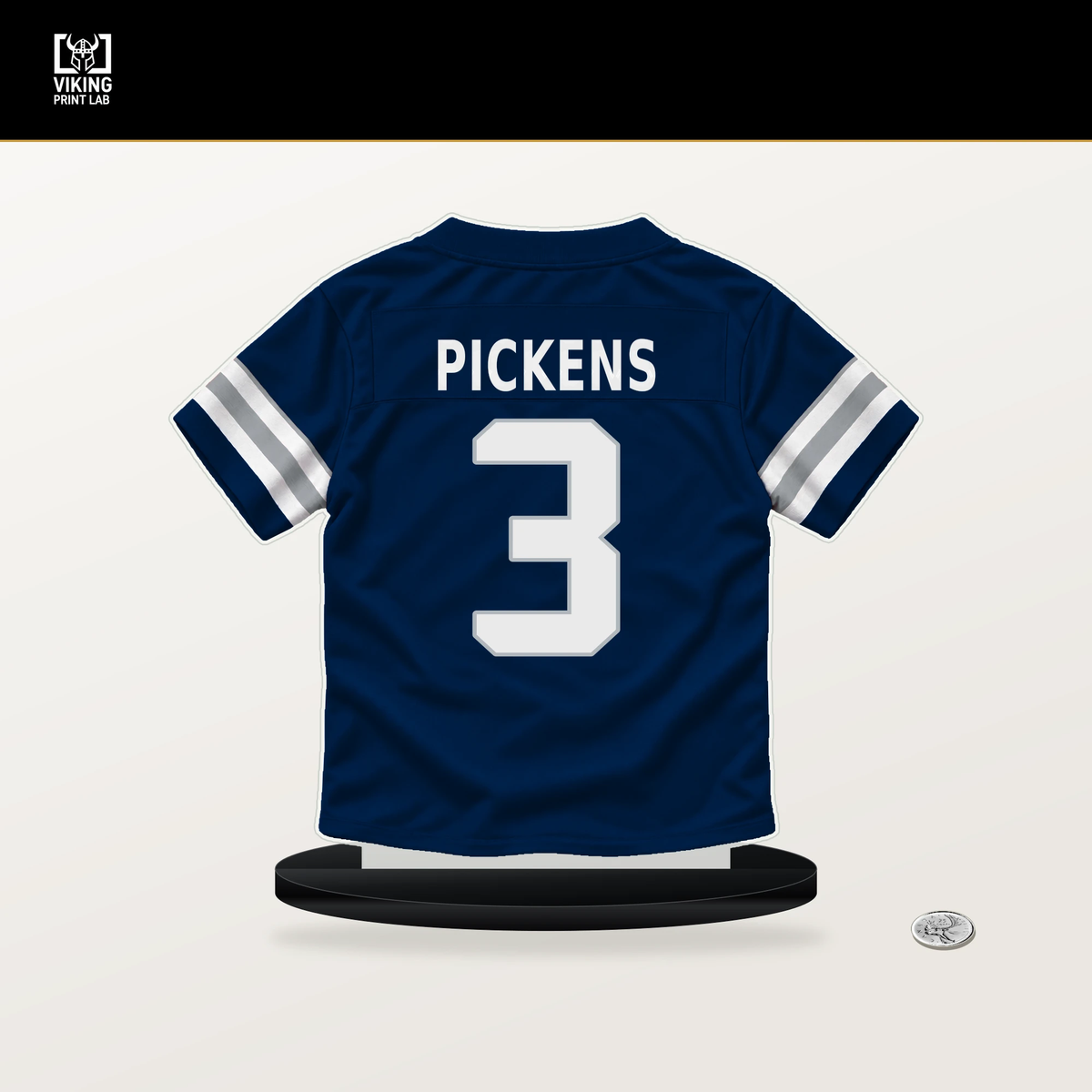 George Pickens number 3 Dallas Cowboys jersey stand with included black base.