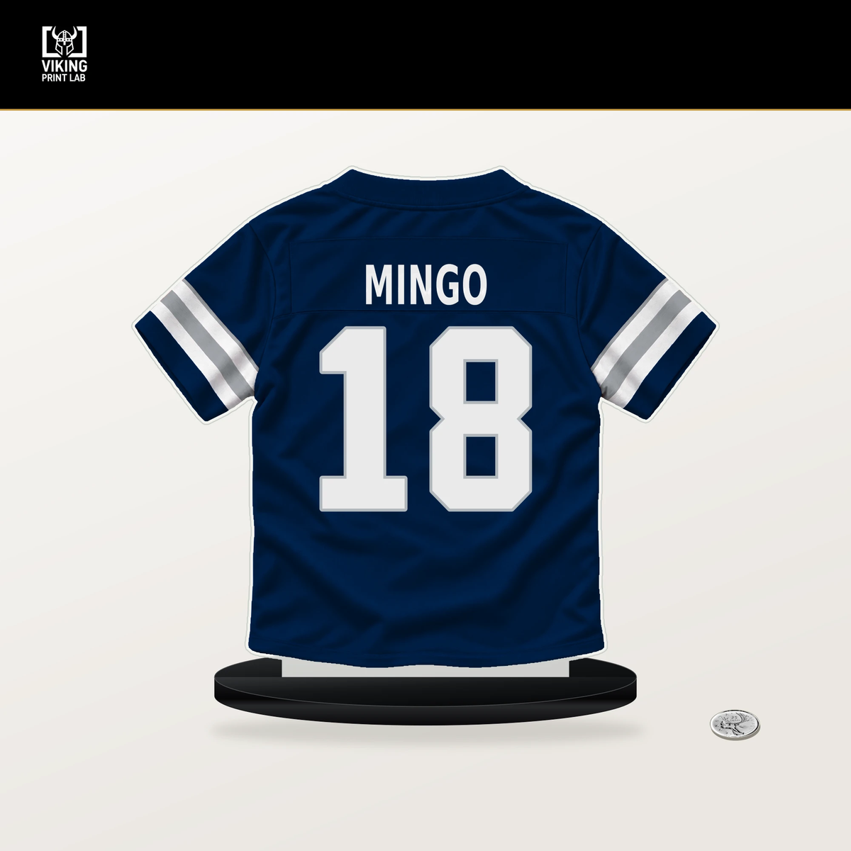 Jonathan Mingo number 18 Dallas Cowboys jersey stand with included black base.
