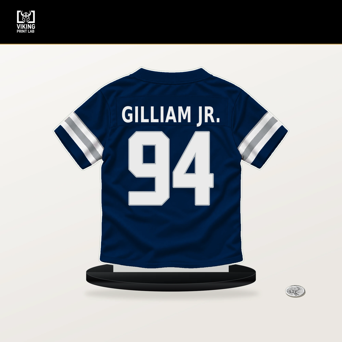 Kelvin Gilliam Jr. number 94 Dallas Cowboys jersey stand with included black base.