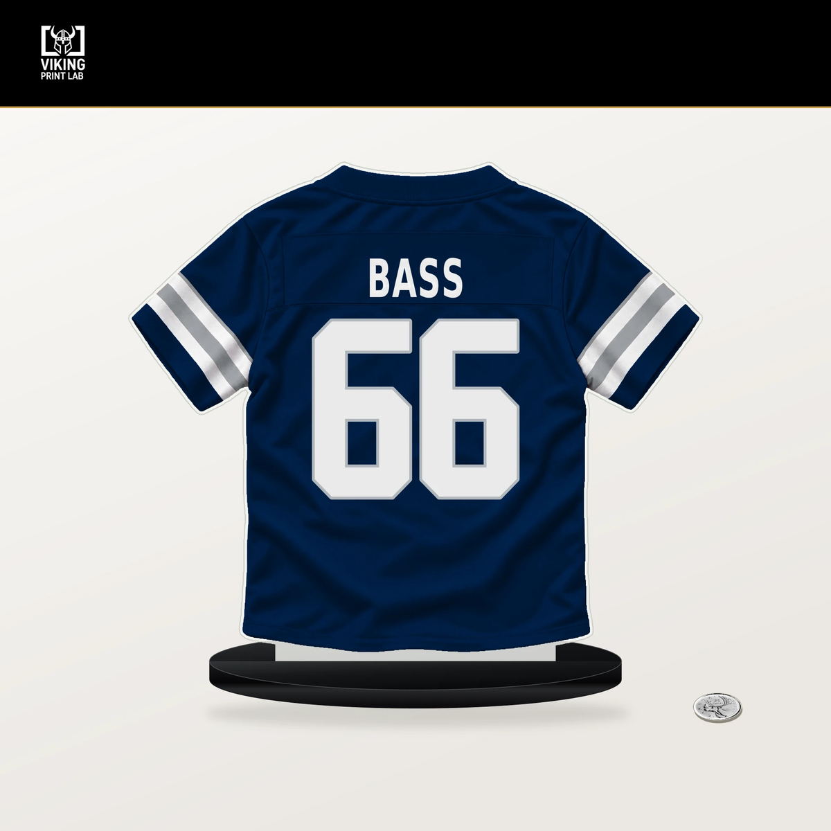 T.J. Bass number 66 Dallas Cowboys jersey stand with included black base.