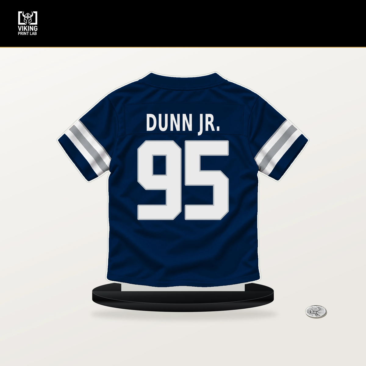 Tommy Dunn Jr. number 95 Dallas Cowboys jersey stand with included black base.