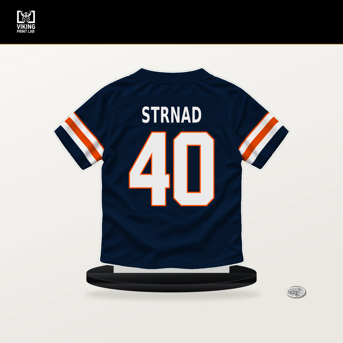 Justin Strnad number 40 Denver Broncos jersey stand with included black base.