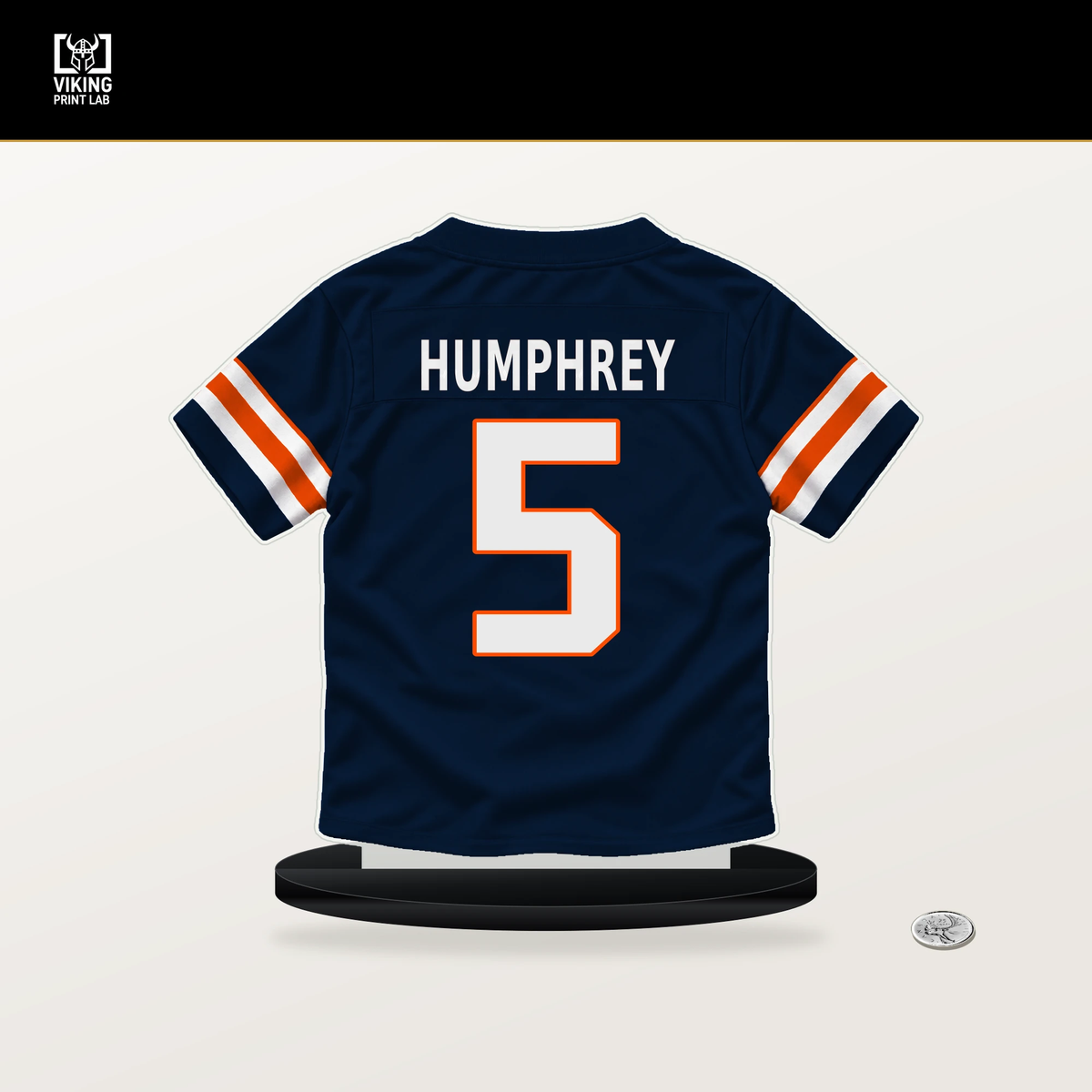 Lil'Jordan Humphrey number 5 Denver Broncos jersey stand with included black base.