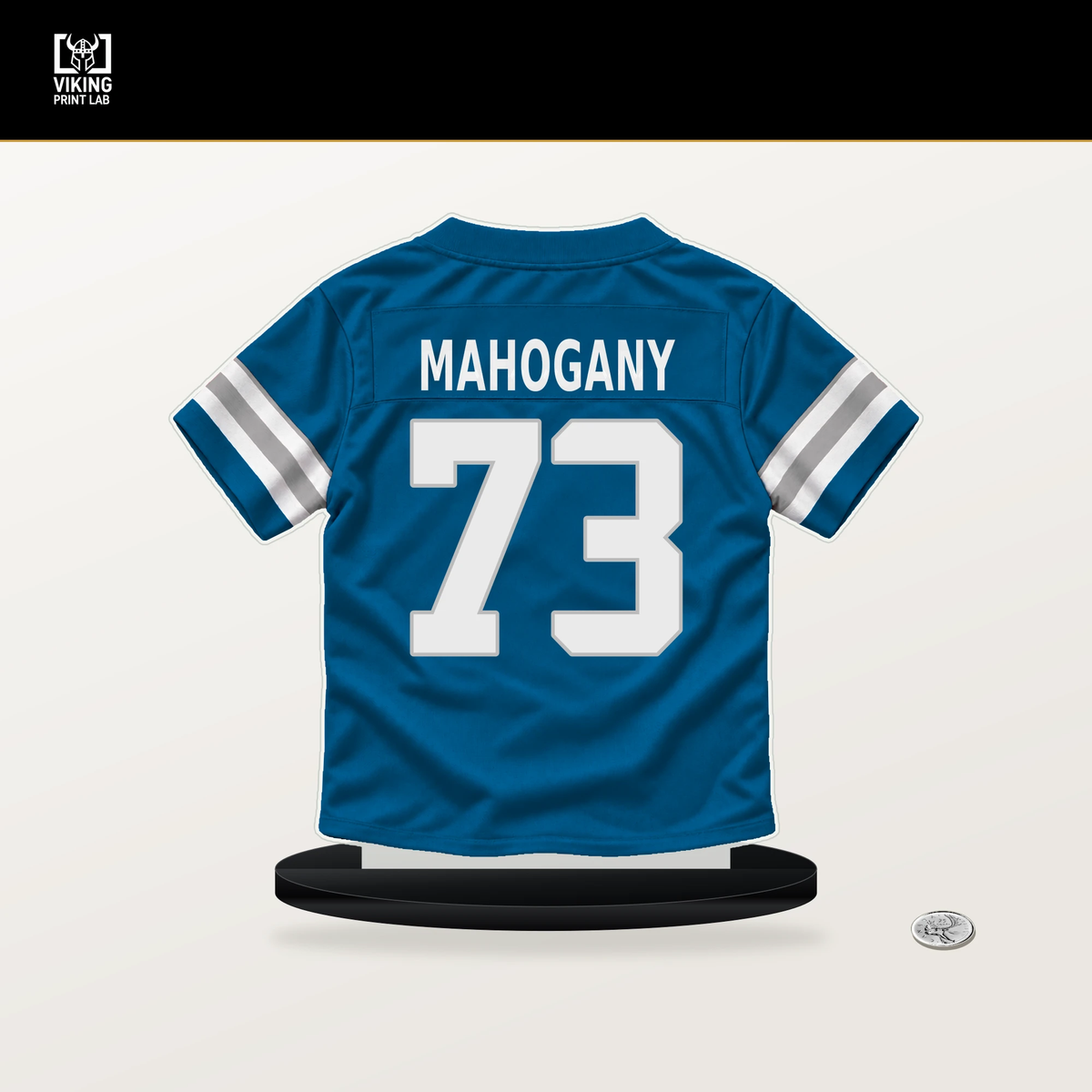Christian Mahogany number 73 Detroit Lions jersey stand with included black base.