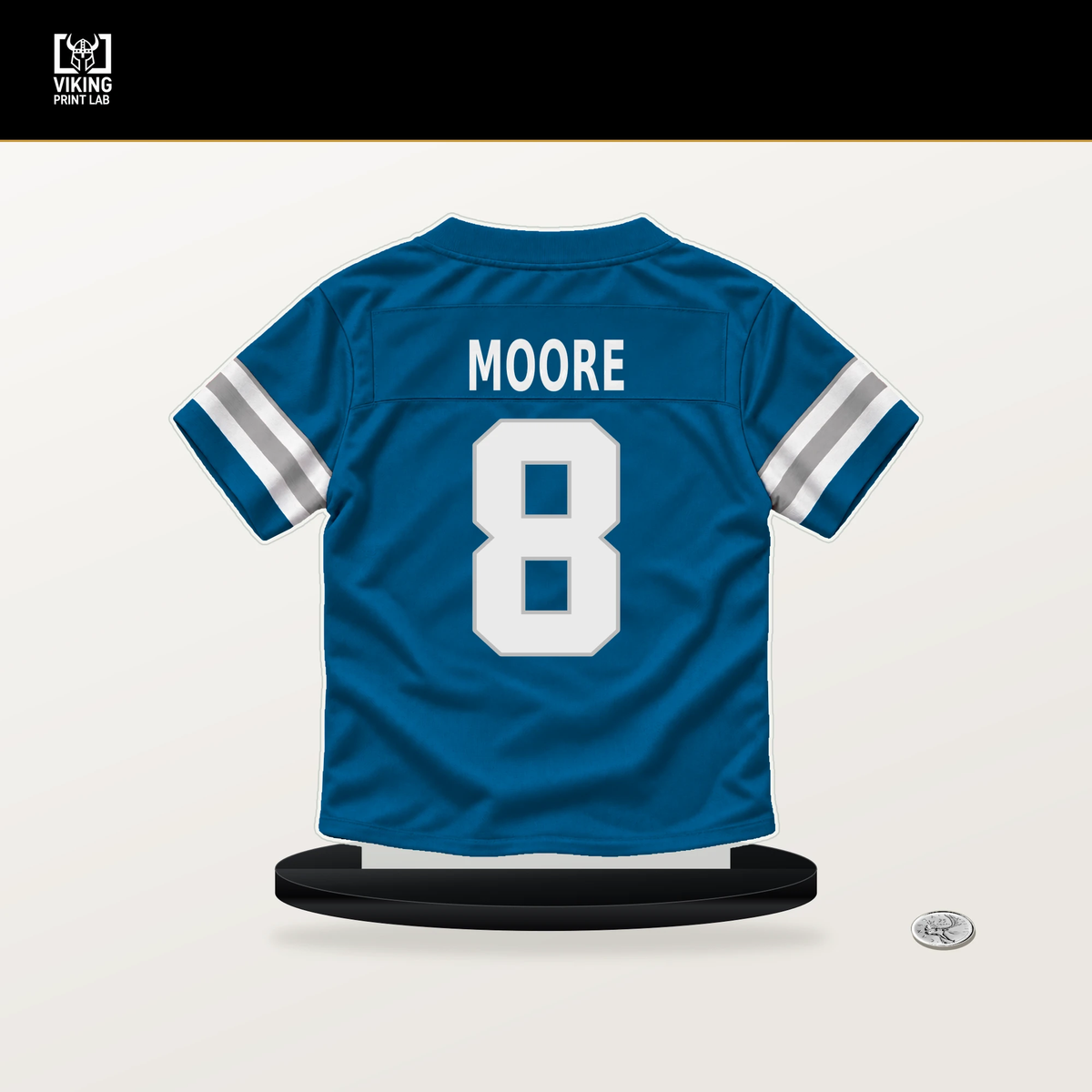 Derrick Moore number 8 Detroit Lions jersey stand with included black base.