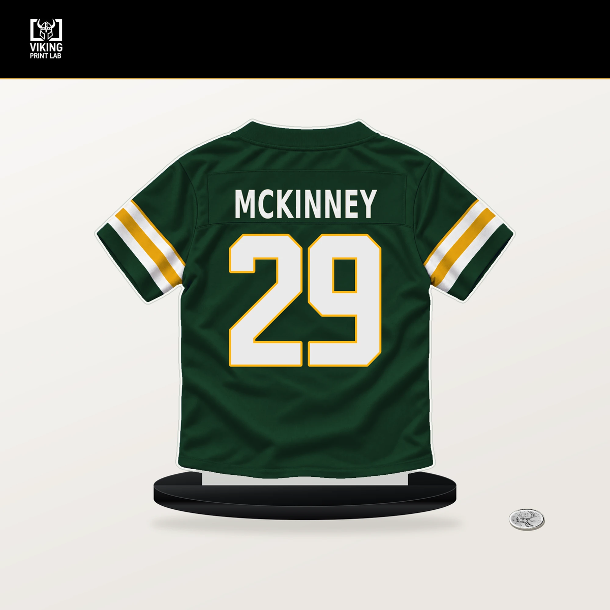 Xavier McKinney number 29 Green Bay Packers jersey stand with included black base.