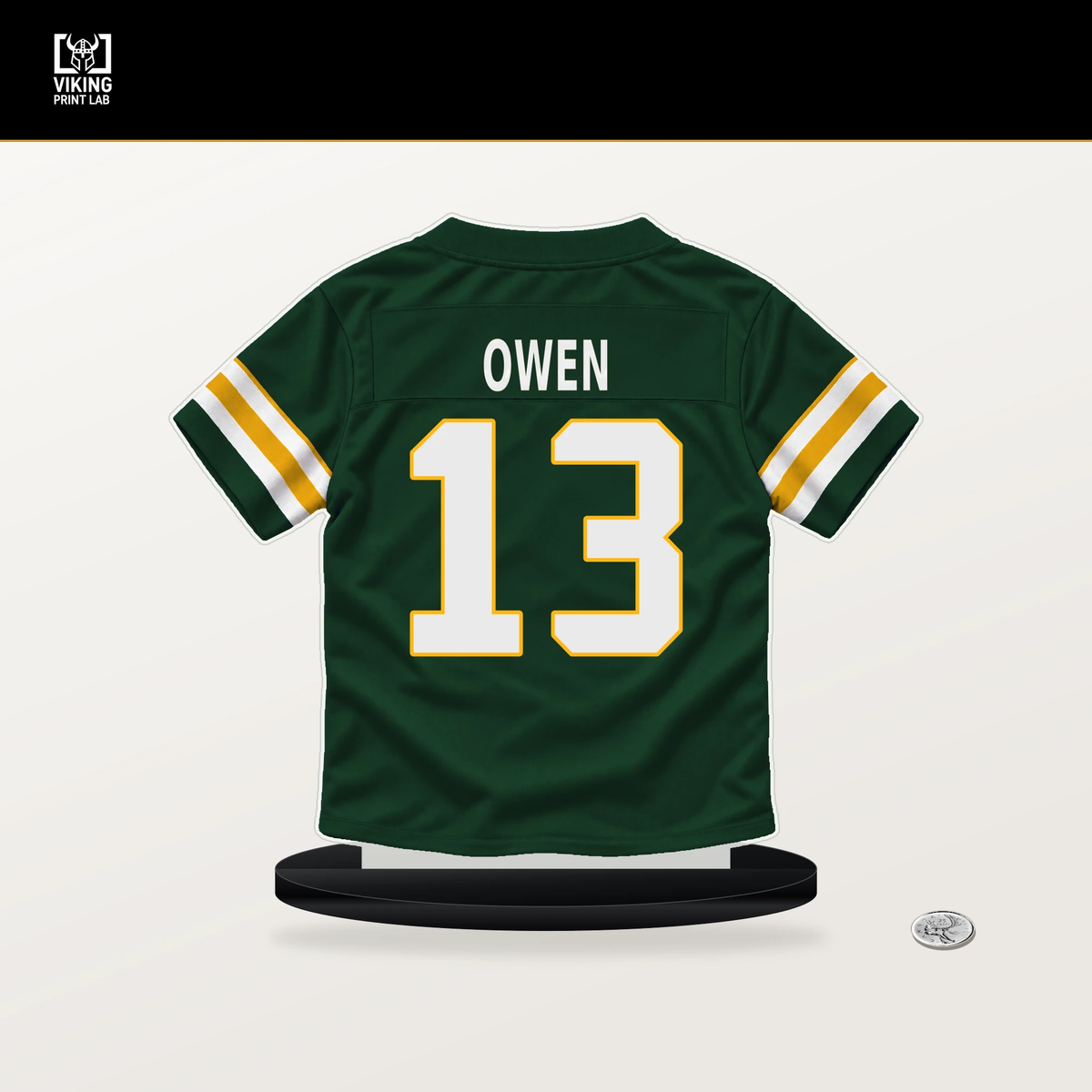 Coleman Owen number 13 Green Bay Packers jersey stand with included black base.