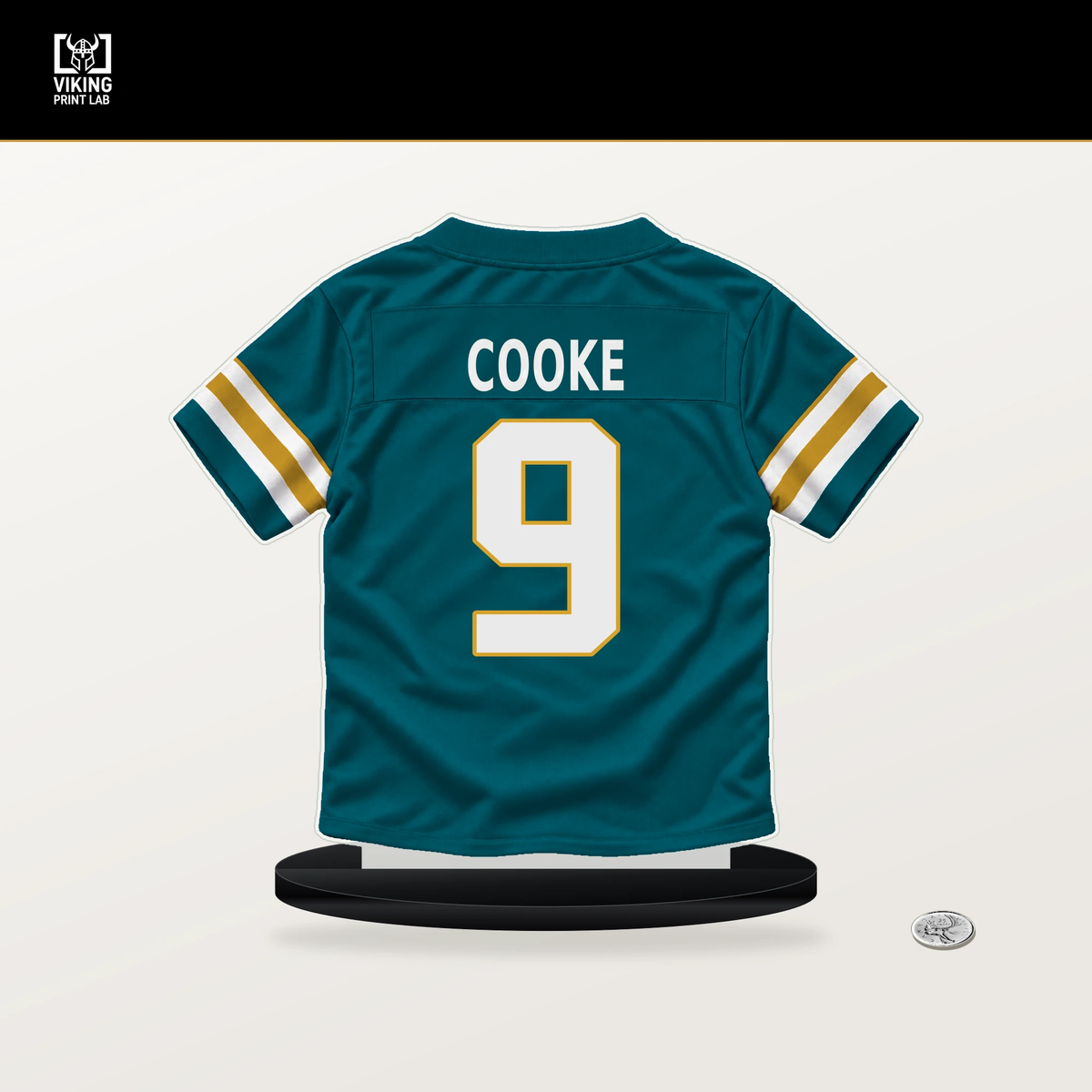 Logan Cooke number 9 Jacksonville Jaguars jersey stand with included black base.