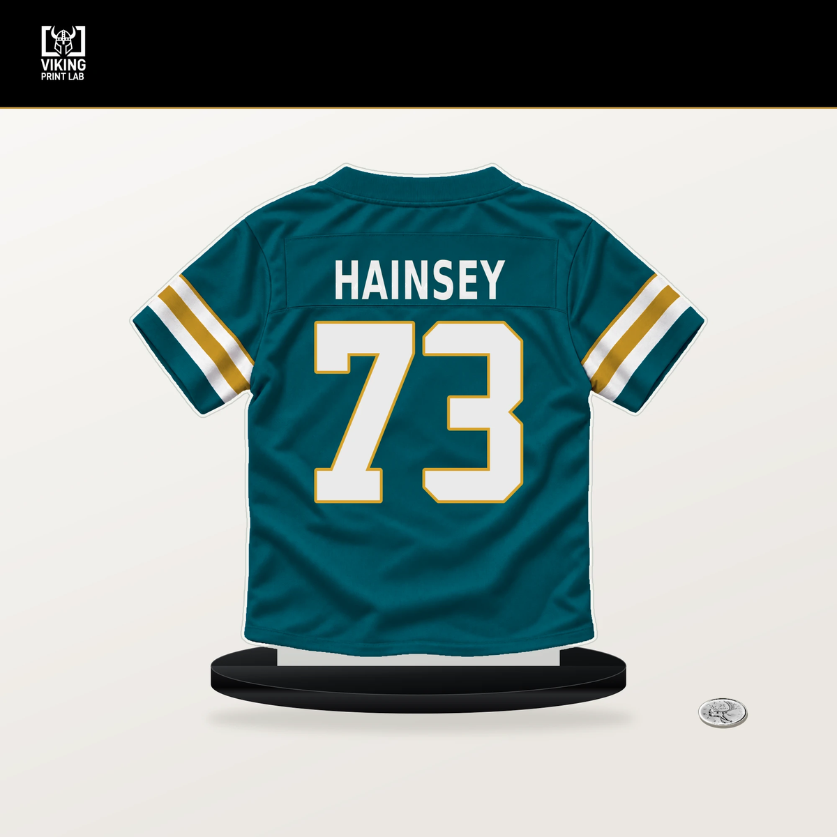 Robert Hainsey number 73 Jacksonville Jaguars jersey stand with included black base.