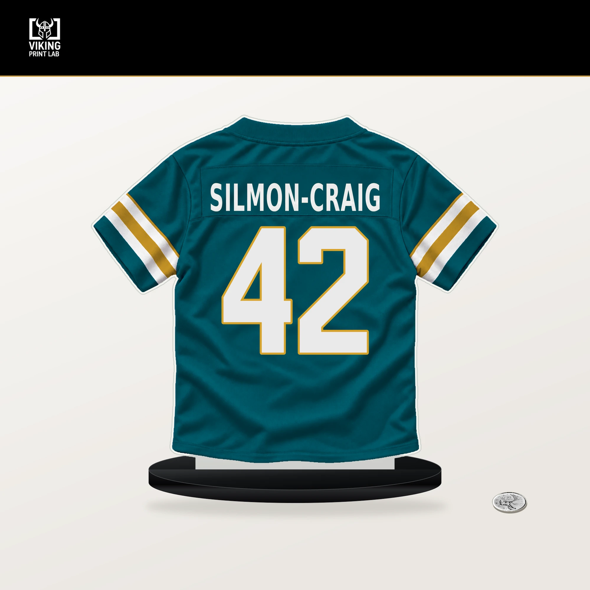 Cam'Ron Silmon-Craig number 42 Jacksonville Jaguars jersey stand with included black base.