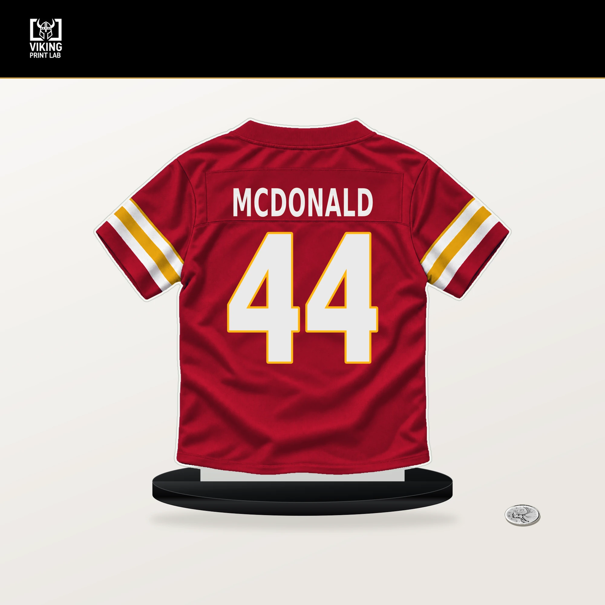 Cooper McDonald number 44 Kansas City Chiefs jersey stand with included black base.