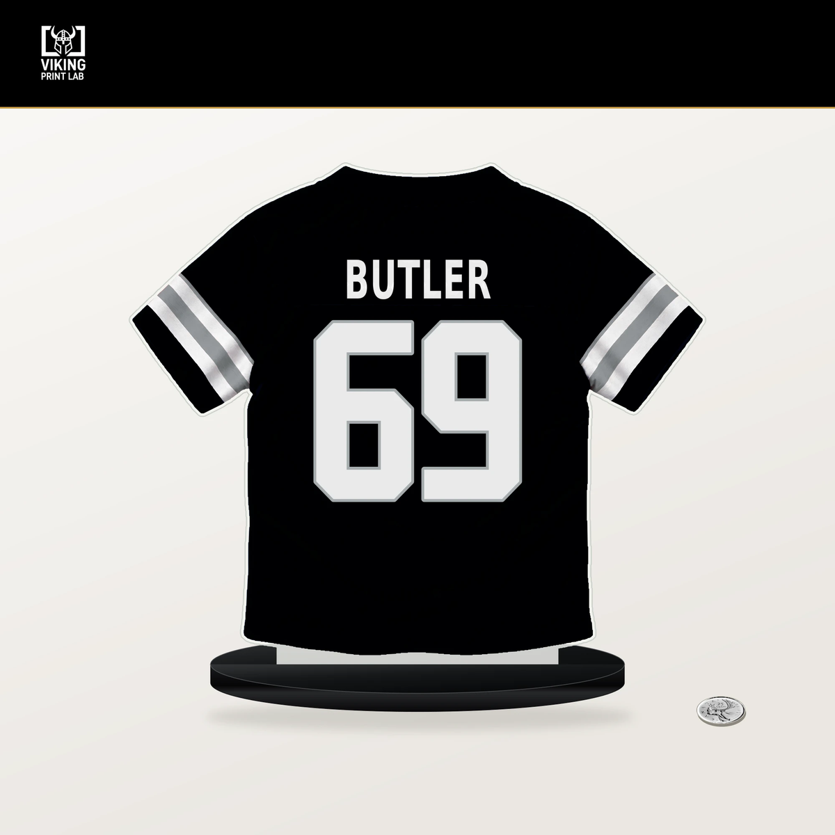 Adam Butler number 69 Las Vegas Raiders jersey stand with included black base.