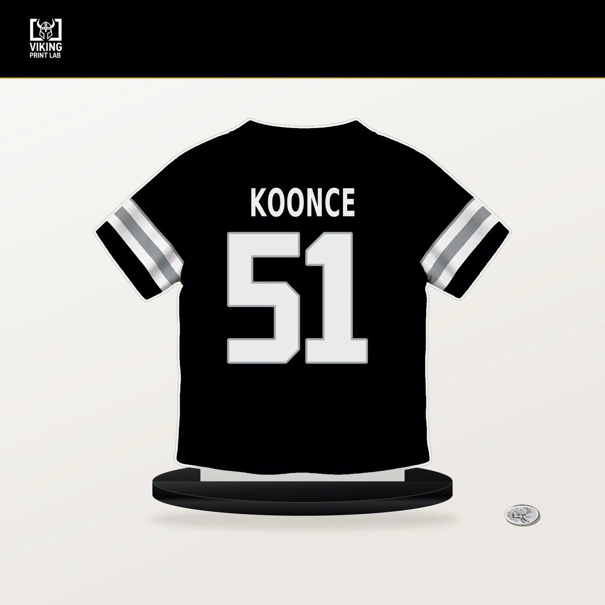 Malcolm Koonce number 51 Las Vegas Raiders jersey stand with included black base.