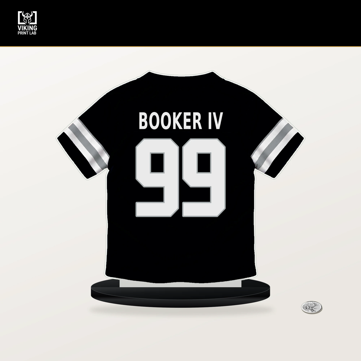 Thomas Booker IV number 99 Las Vegas Raiders jersey stand with included black base.