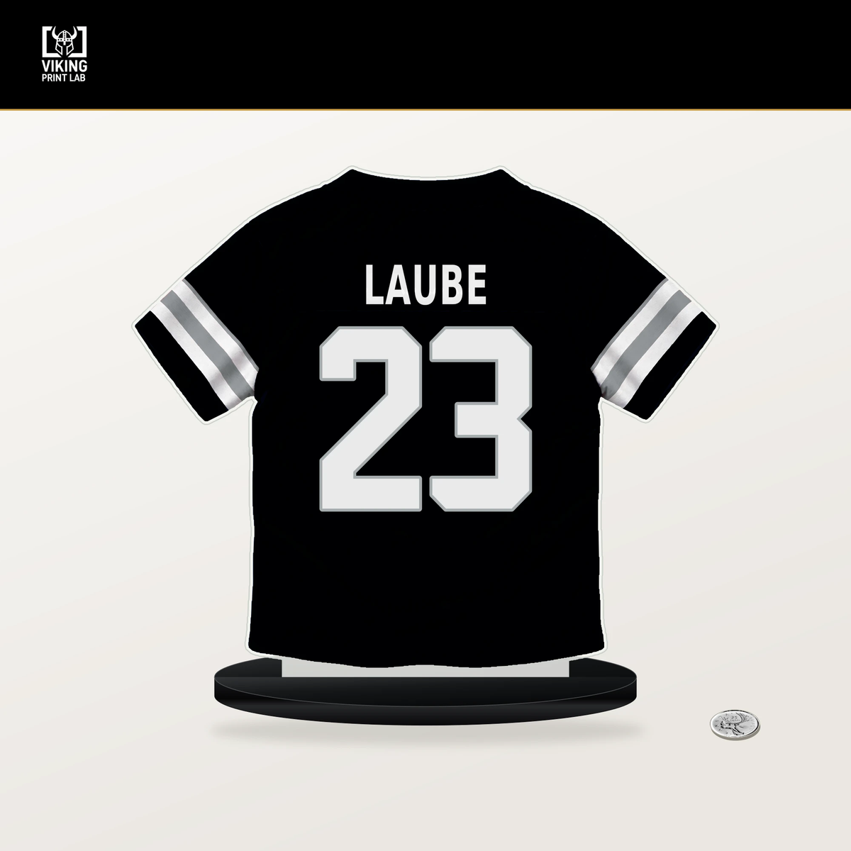 Dylan Laube number 23 Las Vegas Raiders jersey stand with included black base.