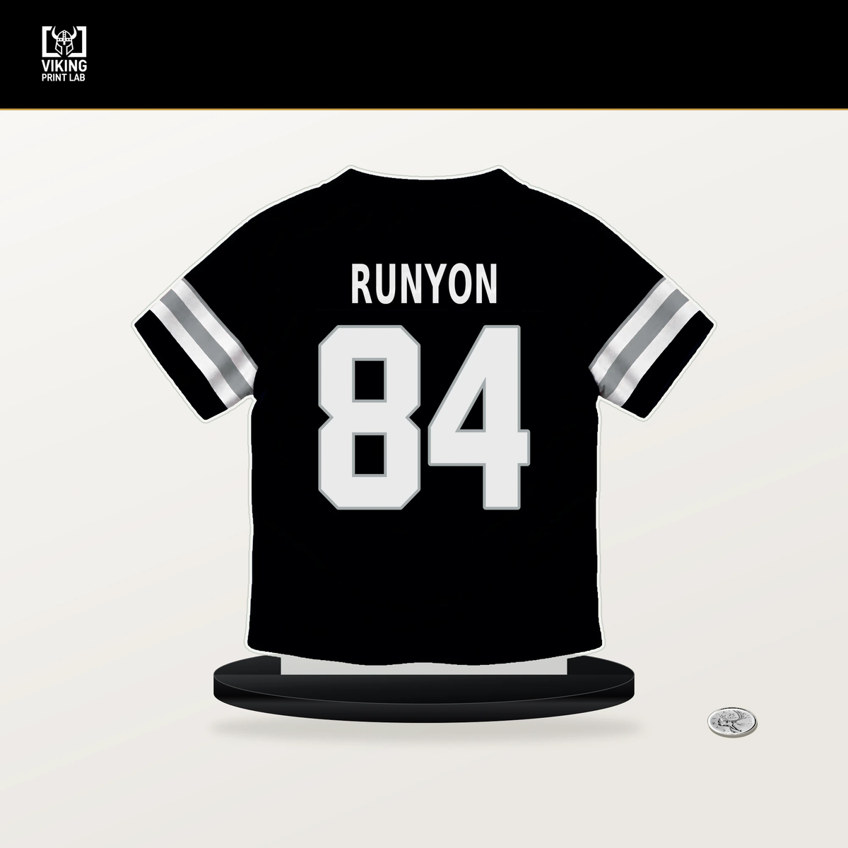 Carter Runyon number 84 Las Vegas Raiders jersey stand with included black base.
