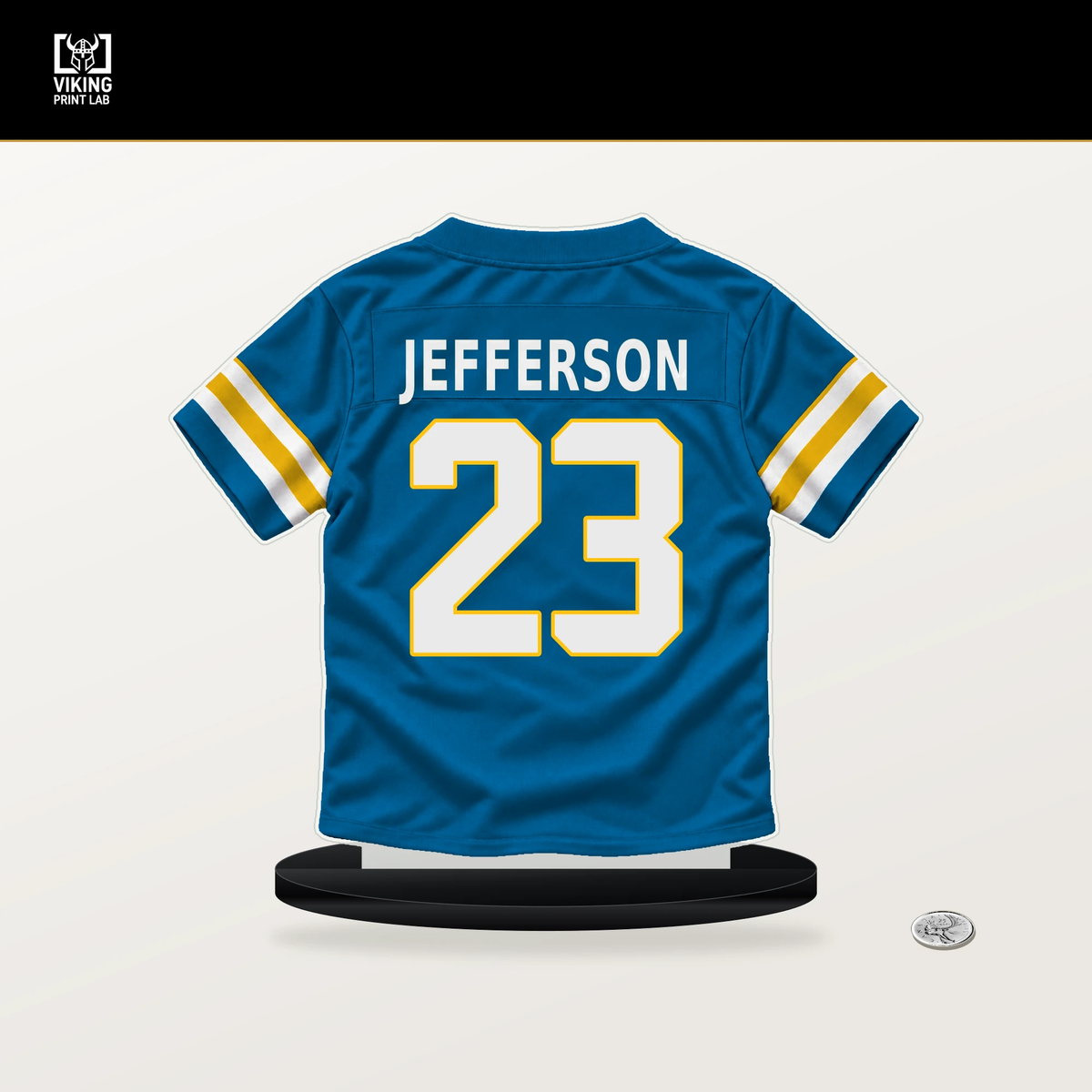 Tony Jefferson number 23 Los Angeles Chargers jersey stand with included black base.