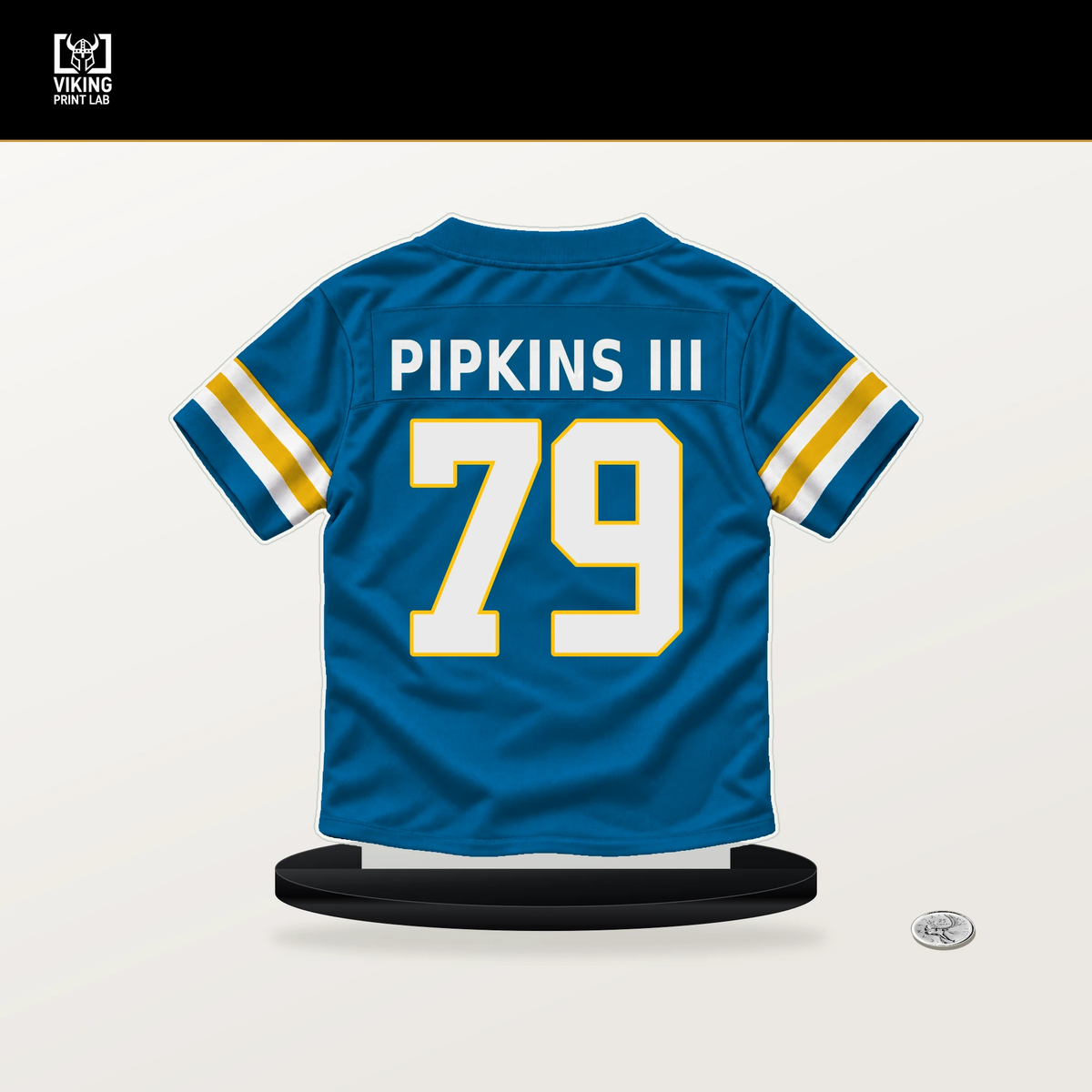 Trey Pipkins III number 79 Los Angeles Chargers jersey stand with included black base.