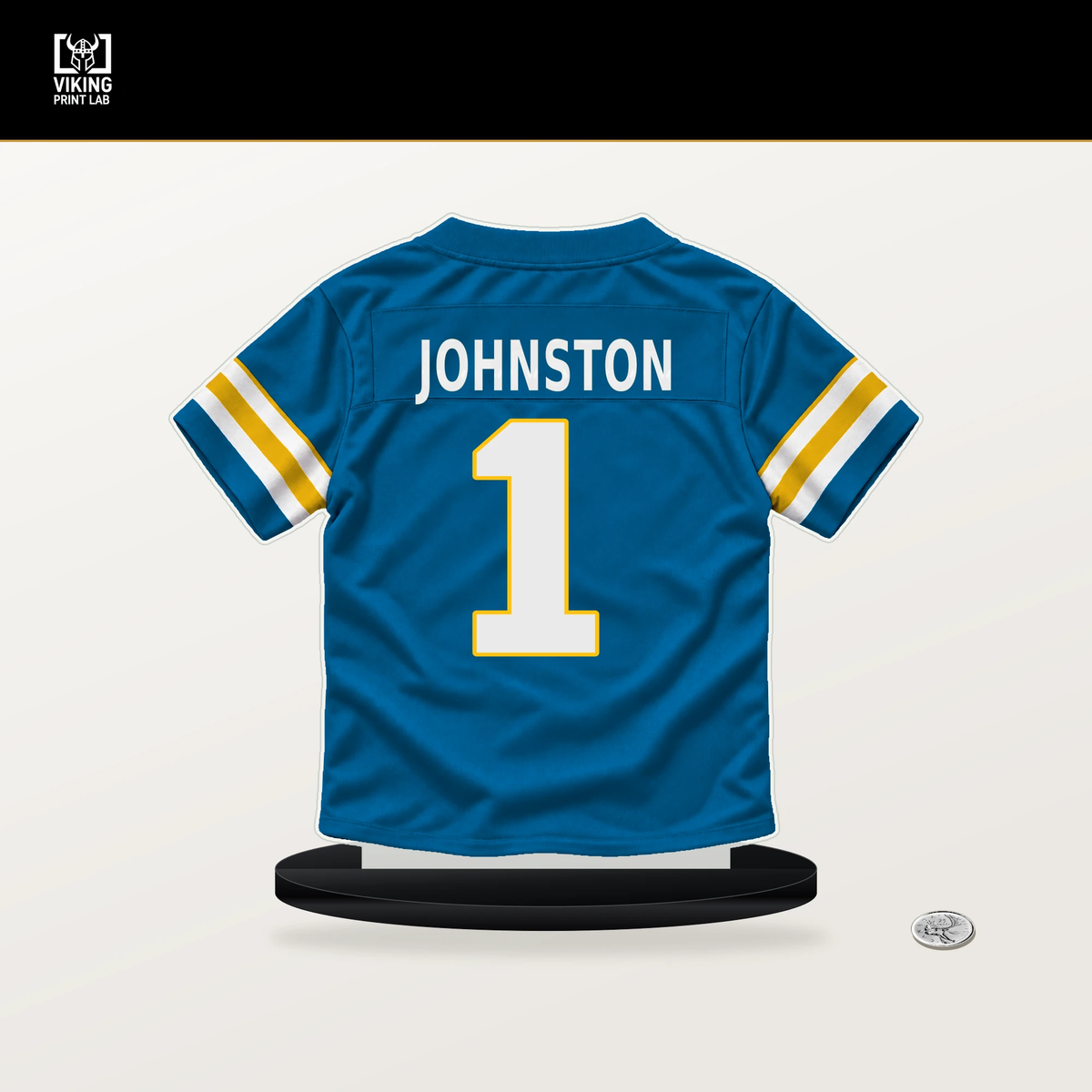 Quentin Johnston number 1 Los Angeles Chargers jersey stand with included black base.