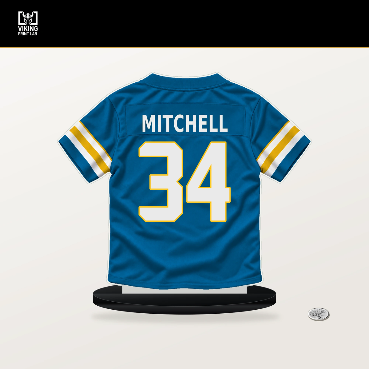 Keaton Mitchell number 34 Los Angeles Chargers jersey stand with included black base.
